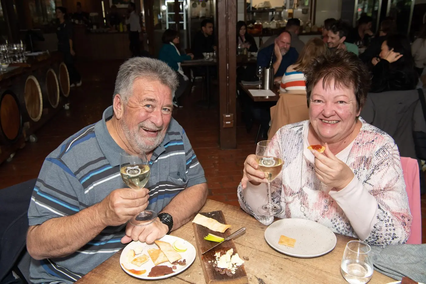 LIVING IT UP: Glen and Yvonne Deegan enjoy a wine and a bite to eat at Brown Brothers on Saturday, as the King Valley\\'s Weekend Fit for a King kicked into gear. PHOTO: Kurt Hickling