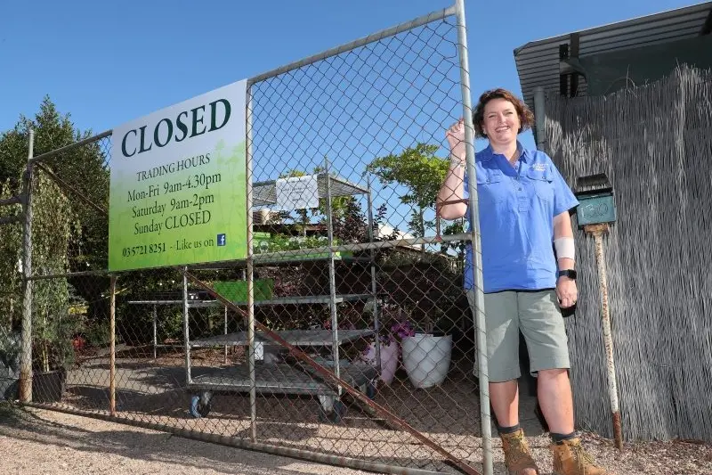 GATES CLOSED BUT BUSINESS OPEN: Mandi McDonald will serve customers of Linga Awhile Nursery from behind the gates to ensure safe social distancing. PHOTO: Kieren Tilly\\n