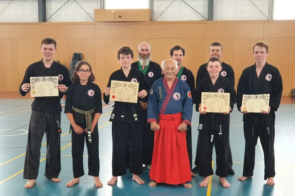 MILESTONE: Pictured at the karate grading are (from left) sempai Hayden Cole, Mani D\\'Agostino, sempai Harvey Dodgshun, sensei Des Mansfield, kancho Terry Lim, sensei Andrew Worland, sempai Xavier Dodshun, dai sempai Tony Mogford, and sempai James Lee. PHOTO: Kathy Dodgshun Id:33655
