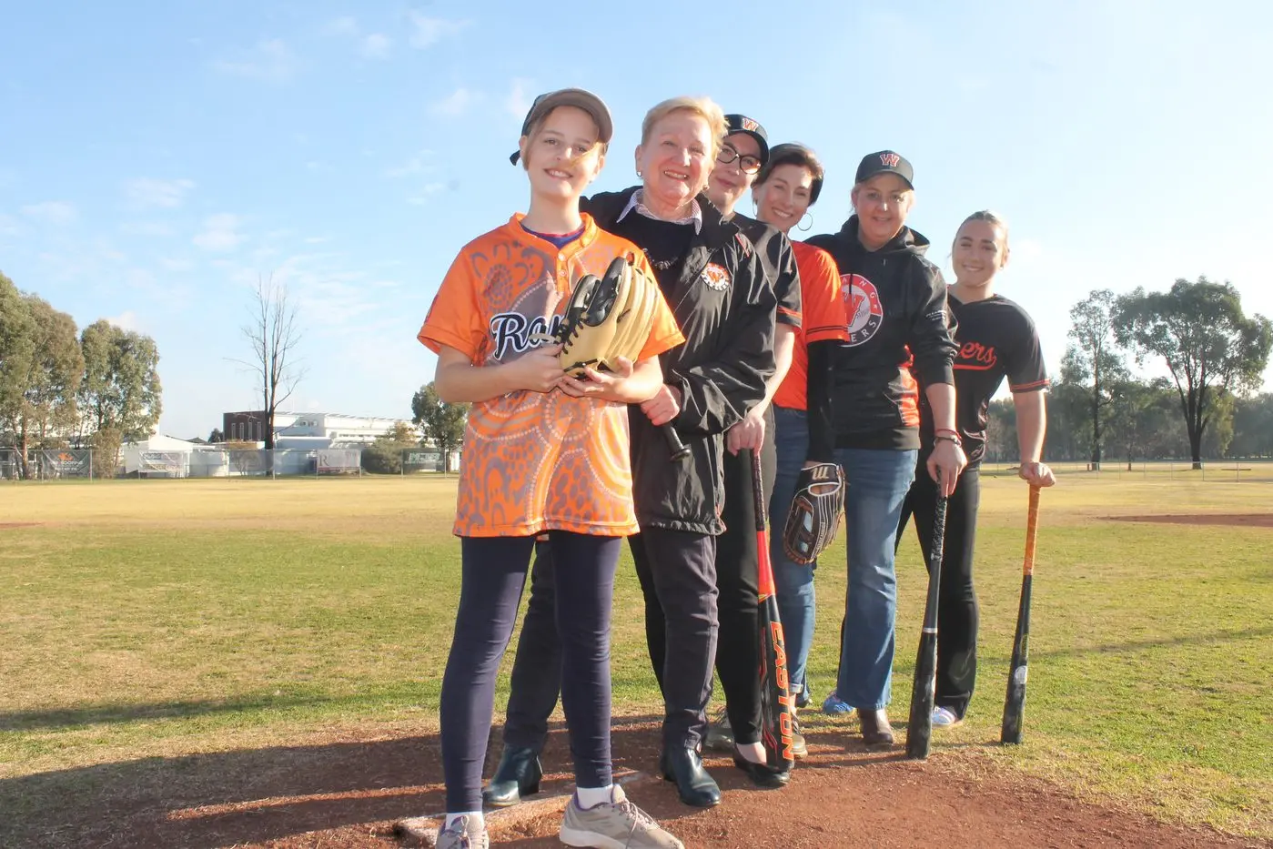 LIGHT \\'EM UP: Council has approved its $120,000 contribution to the Targoora Park Baseball and Softball field lighting project that will benefit more than 400 members at the club. Pictured are Lily Britton (front), Mayor Irene Grant, Leah Dinsdale, Candice Jones, Donna Smedley, and Makayla Pool. PHOTO: Shane Douthie