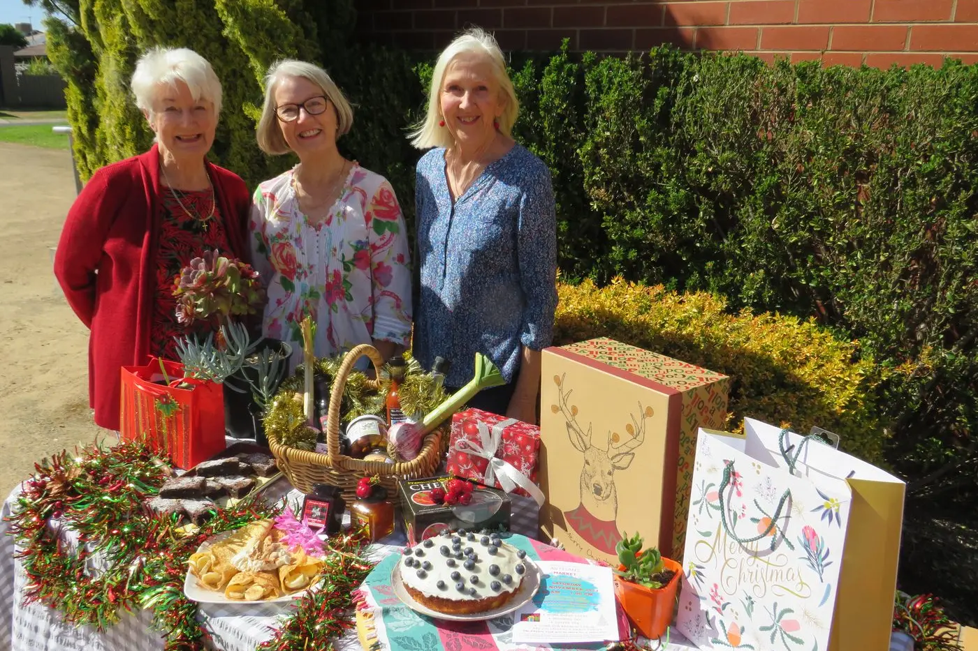 FESTIVE FARE: Margaret Gibson, Dot Hurley and Robyn Coles encourage locals to support the upcoming Wangaratta West and the Warbys Parish Artisans Market, to be held in the grounds of St Michael\\'s Anglican Church on November 18.  PHOTO: Simone Kerwin\\n