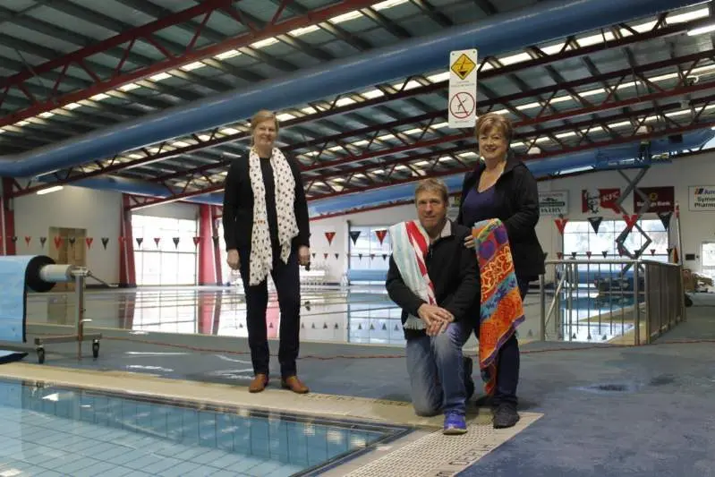 NORMALITY RETURNS: Local couple Chris and Colleen Freeman, along with WISAC manager Maree Warnett (left) are excited to be back in business from today. 