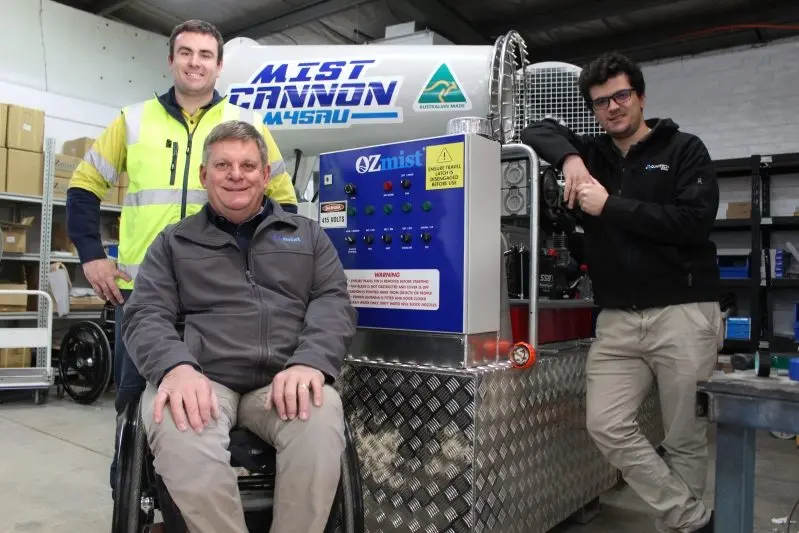 FROM WANGARATTA TO EGYPT: (From left) Justin Bussell, Dean McDonald and Raz Bastadjan with one of the 10 Ozmist mist cannons heading for Egypt. PHOTO: Shane Douthie