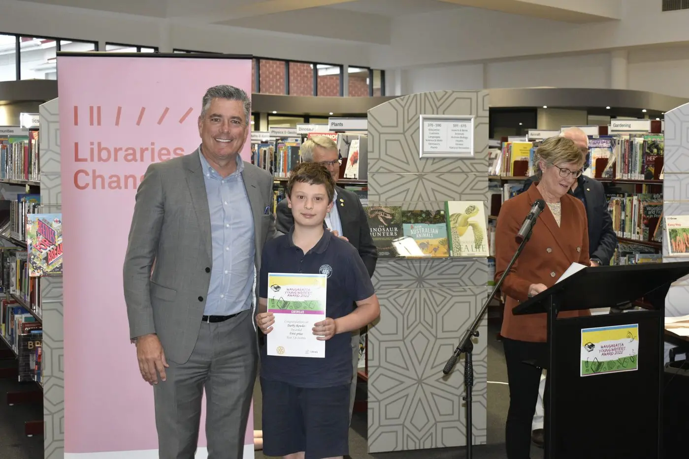 YOUNG WRITER: Darby Rowles, author of the first\\u2013placed story in the year five/six category of the Wangaratta Young Writers Award for 2022, with Rural City of Wangaratta Mayor Dean Rees at the award presentation.  Id:32272