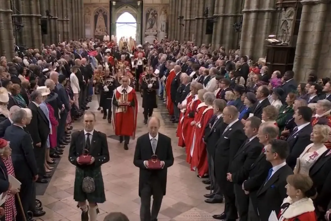 PART OF HISTORY: The 15th Earl of Loudon, Wangaratta\\u2013based Simon Abney\\u2013Hastings (front left in procession), was one of 13 people with ceremonial roles in the coronation ceremony. Id:41093