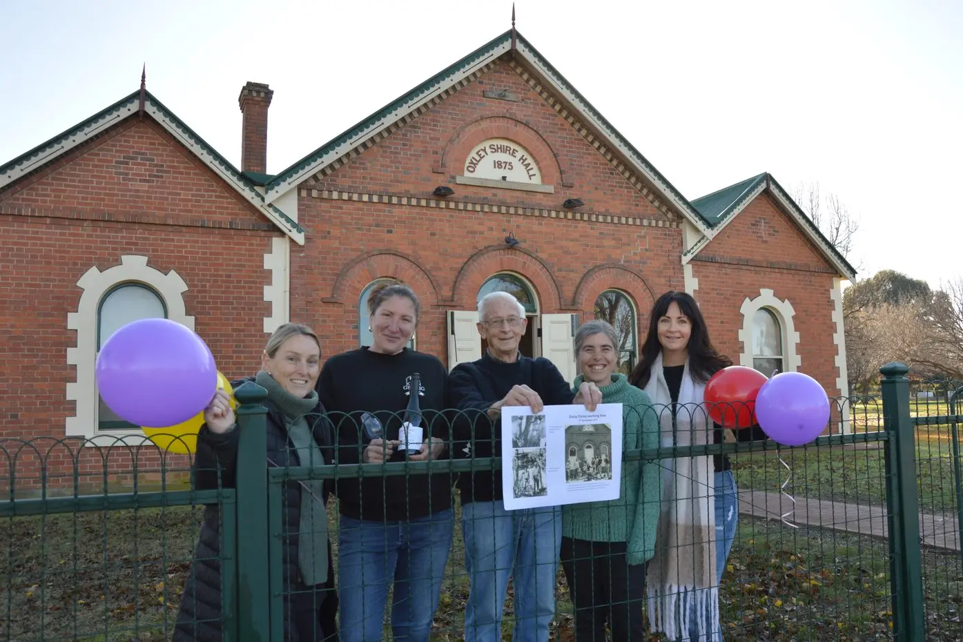 COMMUNITY EFFORT: Oxley residents Karina Fallon, Meghan Gehrig, Neil Brock, Sally Day and Sheree Cashman are among the volunteers who have pitched in to organise a party to celebrate the historic Oxley Shire Hall turning 150. The event on Saturday will recognise the hall\\'s value to the local community, in the past, present and in the future. PHOTO: Anita McPherson