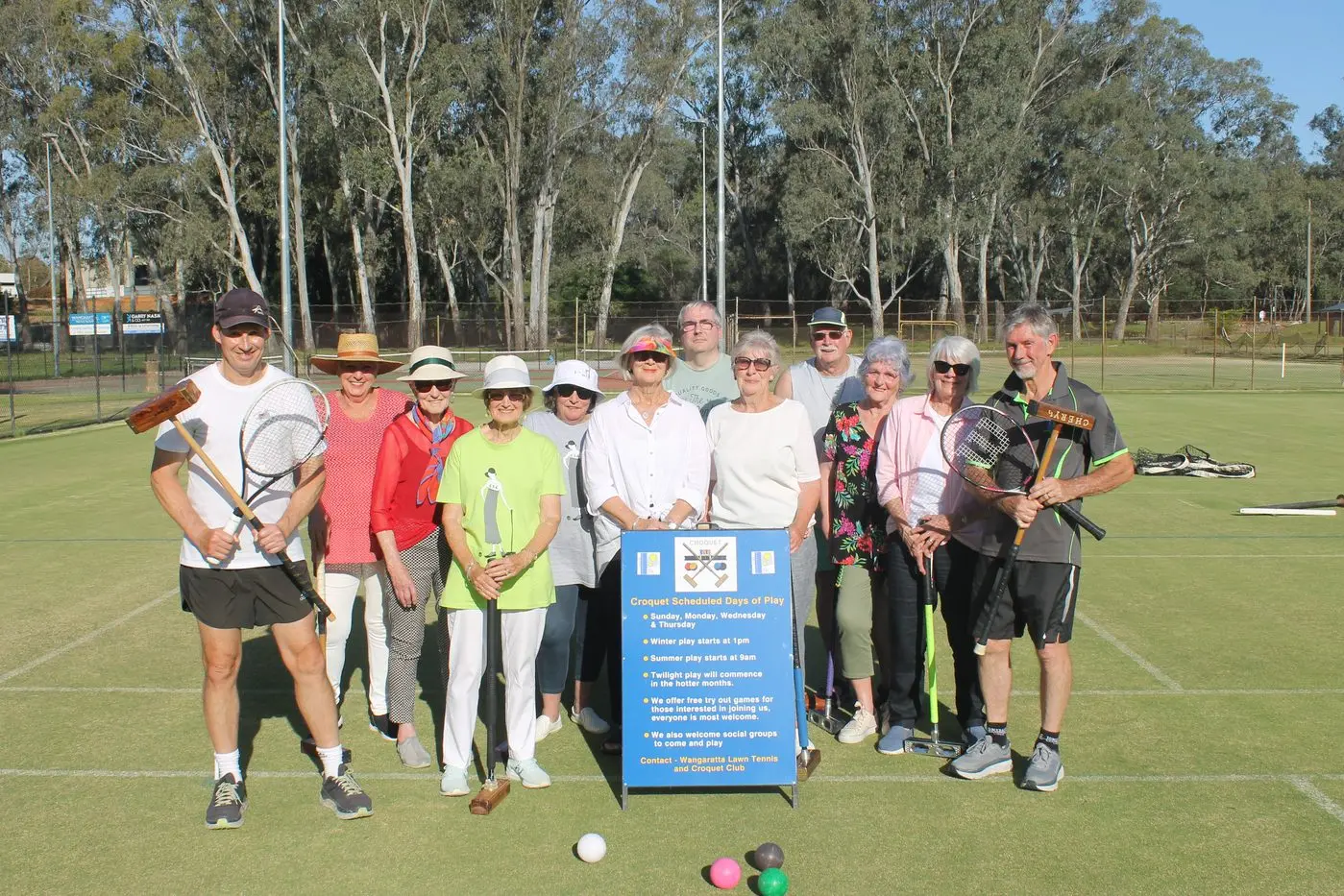 WELCOME: Wangaratta Lawn Tennis Club\\'s Barry Sullivan (far left) and Frank Harris (far right) welcomes croquet to the picturesque Merriwa Park grass courts. PHOTO: Bailey Zimmermann Id:34339