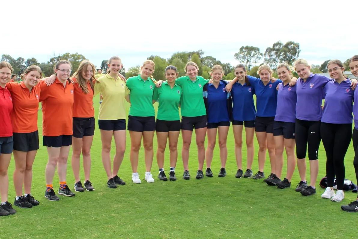 TRUE COLOURS: Showing their house spirit were (from left) Chloe Collins, Alysha Brough, Amaya Moule, Charlotte Brundell, Charlotte Roberts, Caitlin Timmers, Mikayla Contessa, Chantelle Dickson, Sophie Sacco, Mattea Roso, Misha Thompson, Diaz Matthews, Mia Johnson, Isabella Cairncross and Mikayla Bellinger. Id:41703