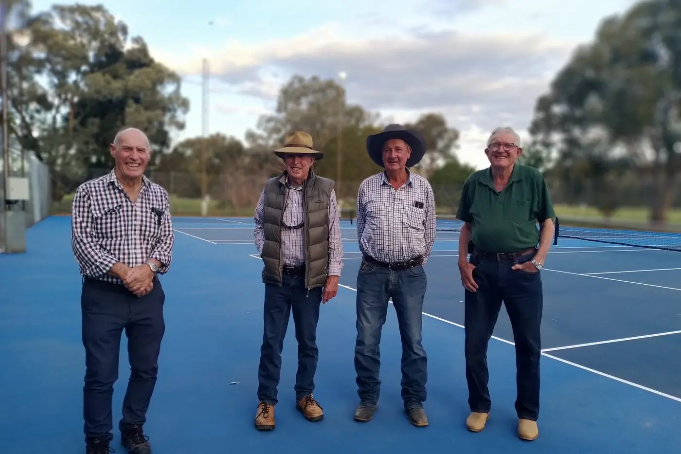 A JOB WELL DONE: Members of the project committee of the original courts Arthur Bennett, Ron Dawon, Dennis Heywood and Max Allen turned on the lights at the new courts.