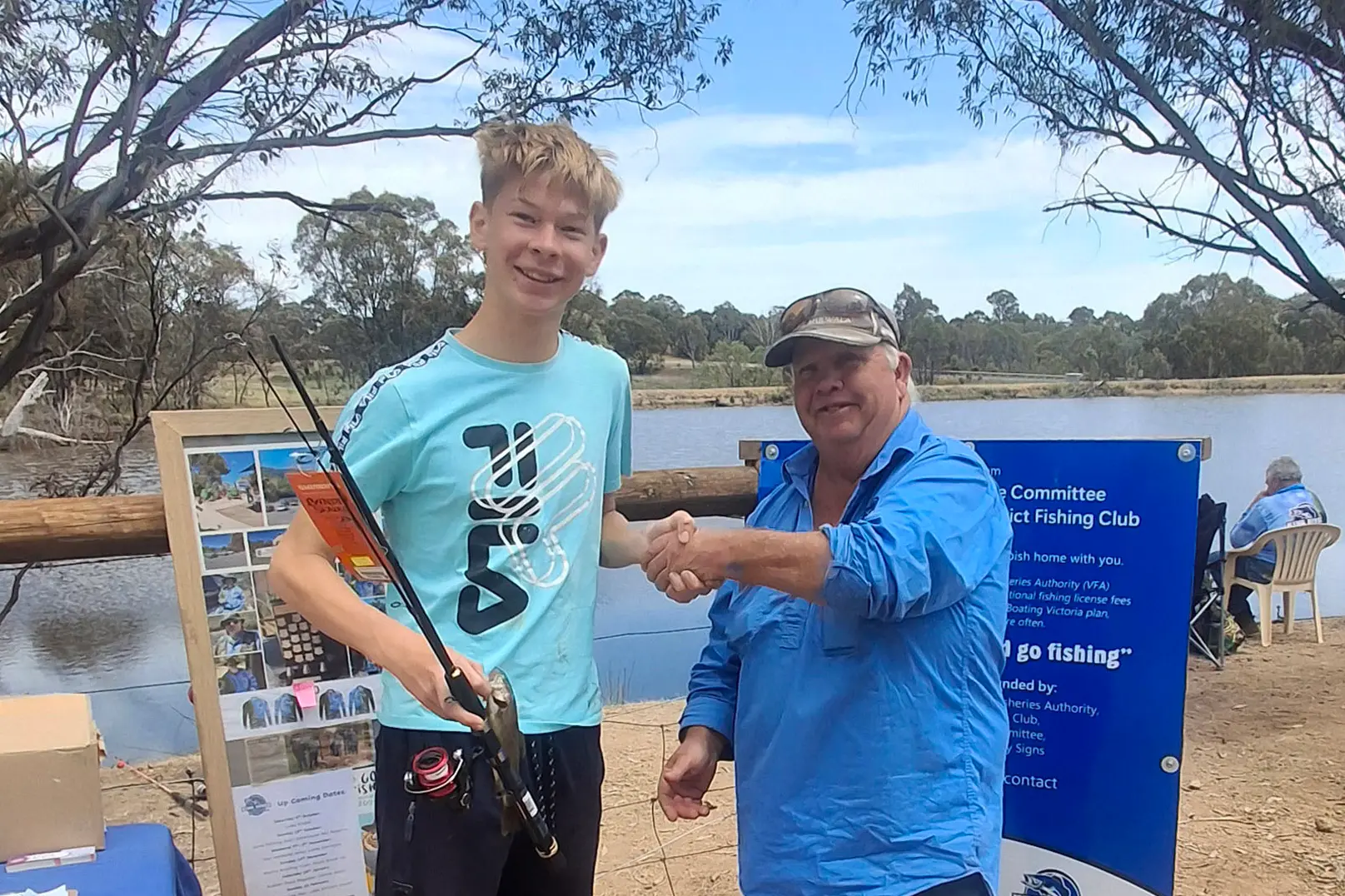 <p>PRIZE WINNER: Alex McGregor (14) from Melbourne caught the first fish on the day and was congratulated by King River & District Fishing Club president, Mick Storey. PHOTOS: Regina Crameri</p>\\n