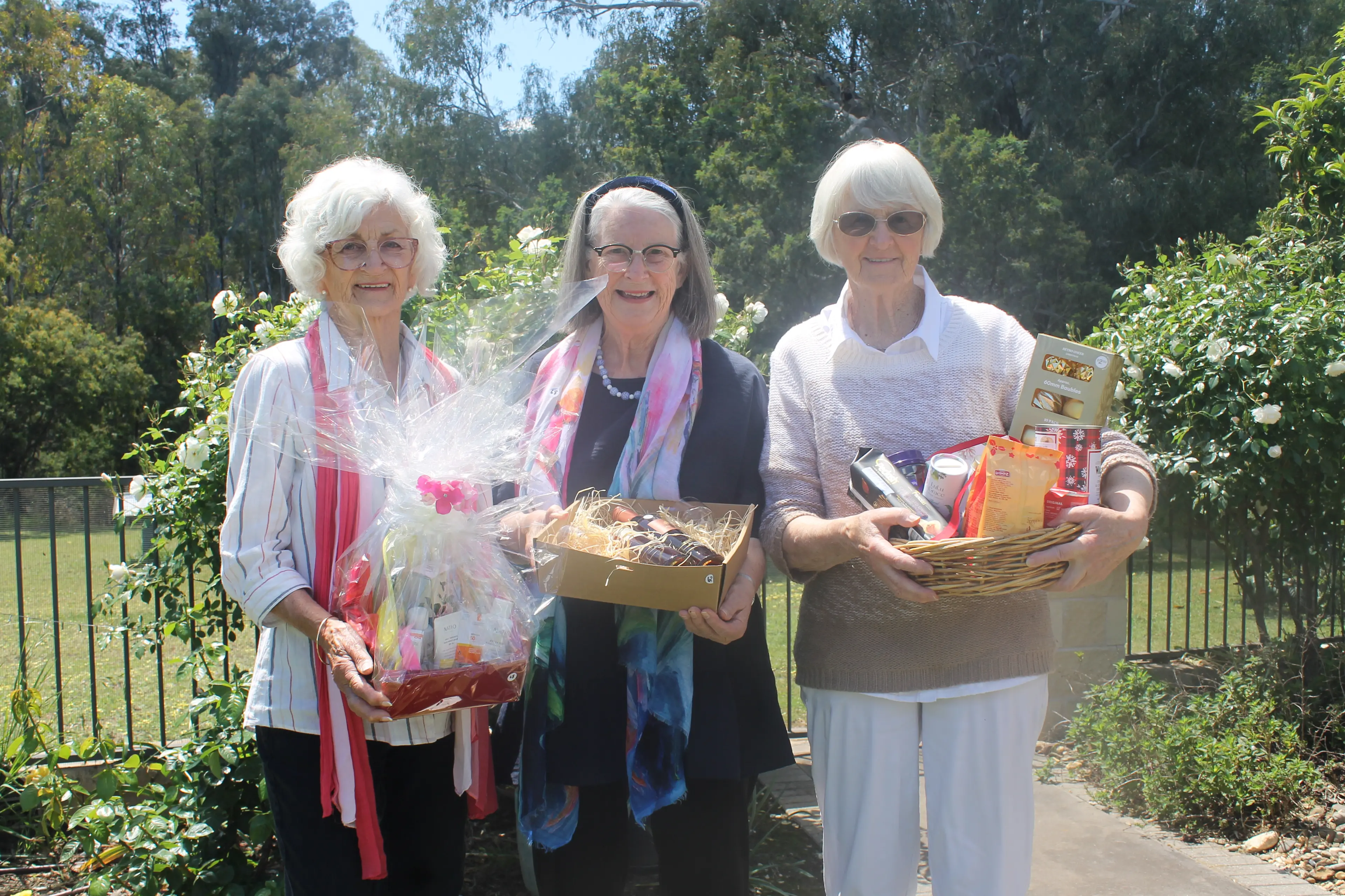 <p>GIVE FOR A GIFT: Organisers Kay Adamas, Lois Knox and Jen Kirby look forward to gifting these high-value hampers to their future owners at Zonta\\'s silent auction and dinner on Saturday, 15 November. PHOTO: Jordan Duursma</p>\\n