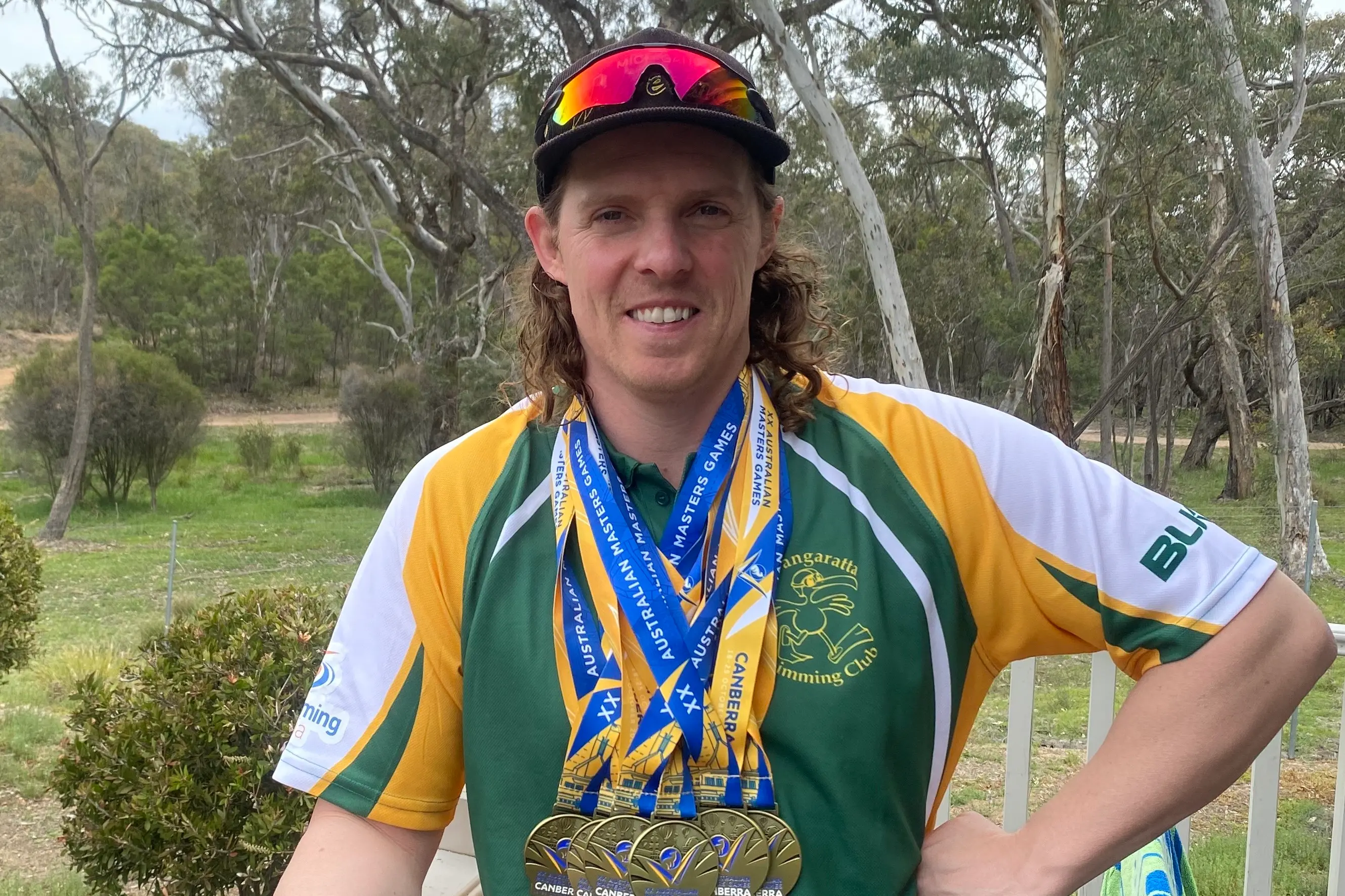 <p>GILT WITH GOLD: Aron Lombardi shows off his gold medal haul from the Australian Masters Games.</p>\\n