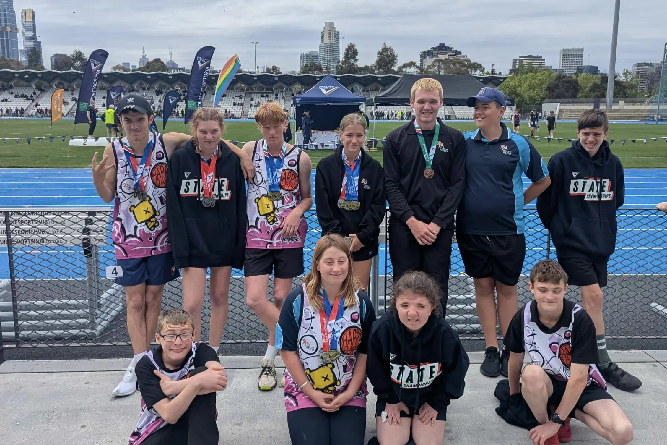 <p>PERFORMING AT STATE LEVEL: Wangaratta District Specialist School students (back) Dylan Vescio, Hayley Watts, Harry White, Lara Pearson, Jack Elliot-Scragg, Tyler Pearson, Victor Austin, (front) Xavier Barkwith, Victoria Waddell-Laing, Lilyarna Kendal and Corry Unthank at the School Sport Victoria Track and Field State Championships.</p>\\n