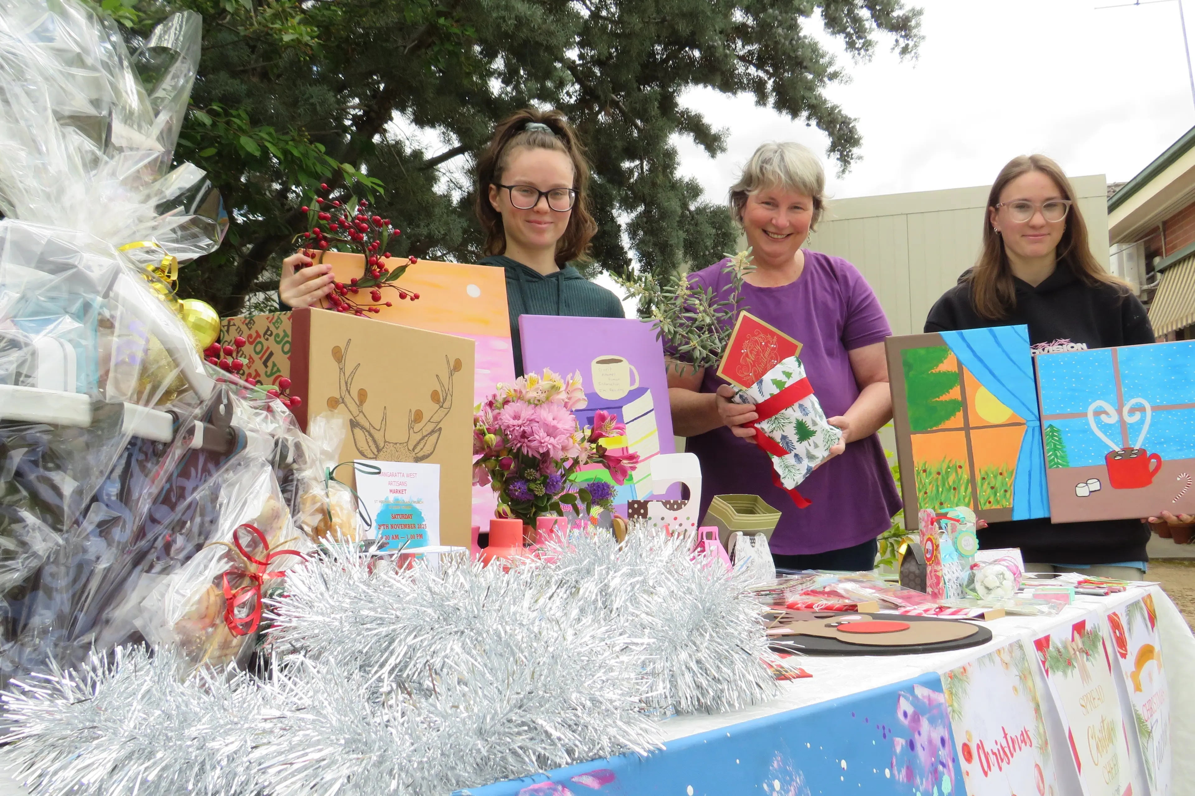 <p>COLOURFUL ARRAY: Kaitlyn Broady, Trish Gooch and Victoria Broady will be among the stallholders at the next Wangaratta West Artisans Market, to be held on Saturday, 29 November at St Michael\\'s Anglican Church.  PHOTO: Simone Kerwin</p>\\n