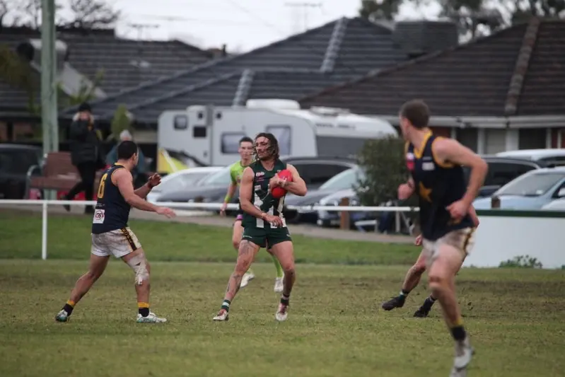 <p>MORE THAN FOOTY: Lachlan Di Sebastiano (centre) is running from Melbourne to Mulwala to raise money for dementia support as part of preseason training.</p>\\n