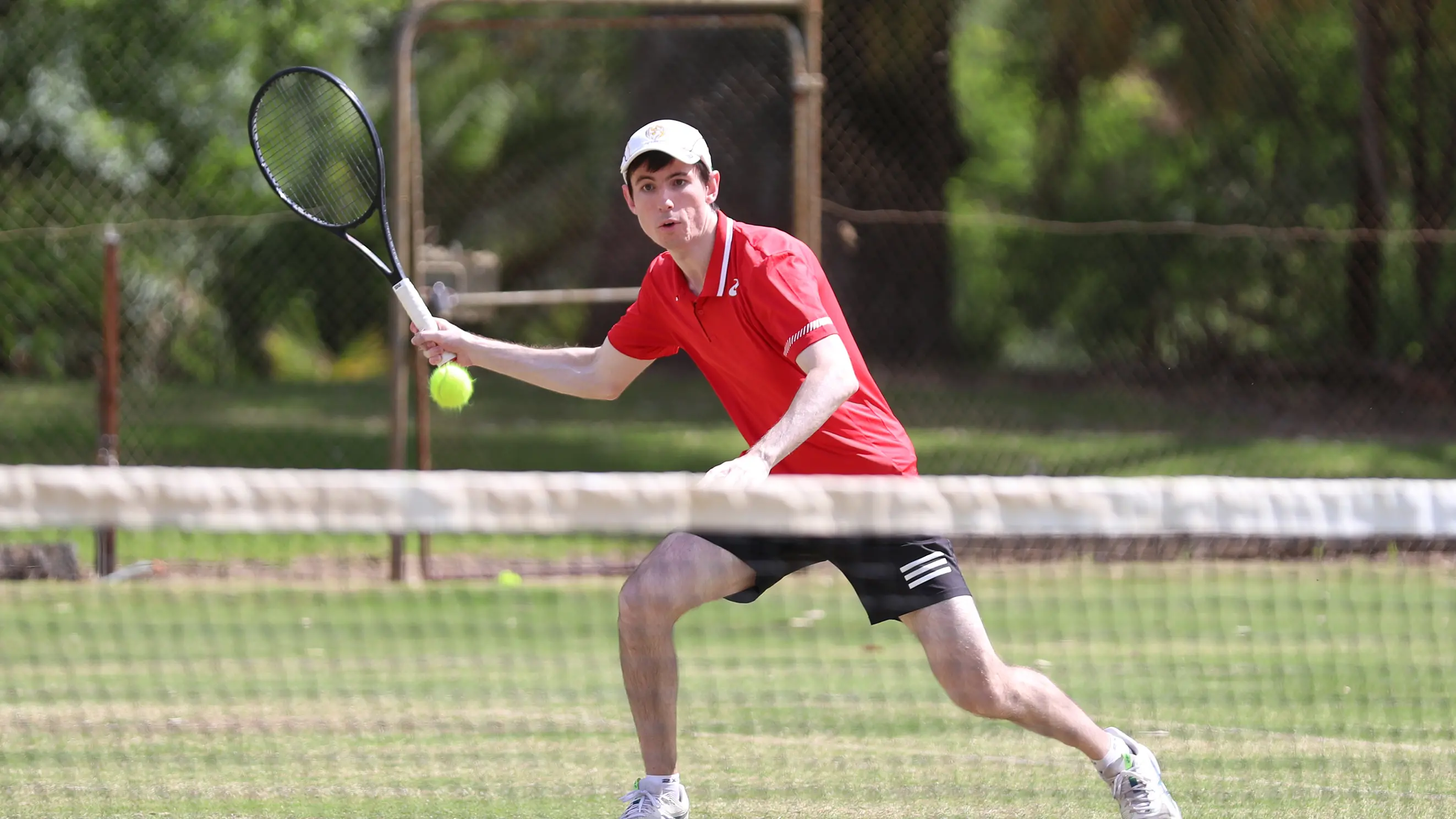 Players sweat through tough aggregate tennis tournament