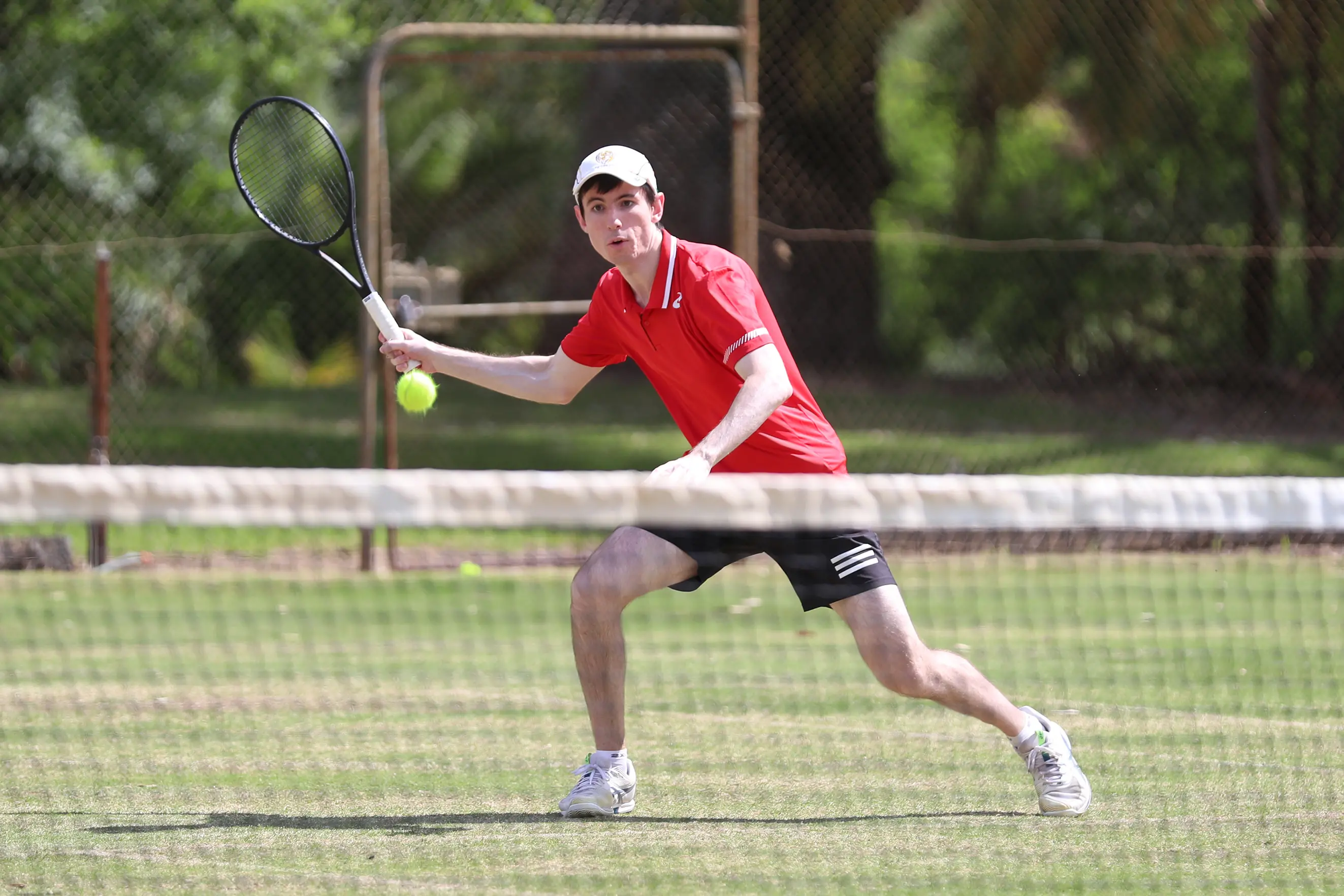 <p>PREPARED: Andrew Lindner sets himself to fire the ball back across the net. PHOTO: Melissa Beattie</p>\\n