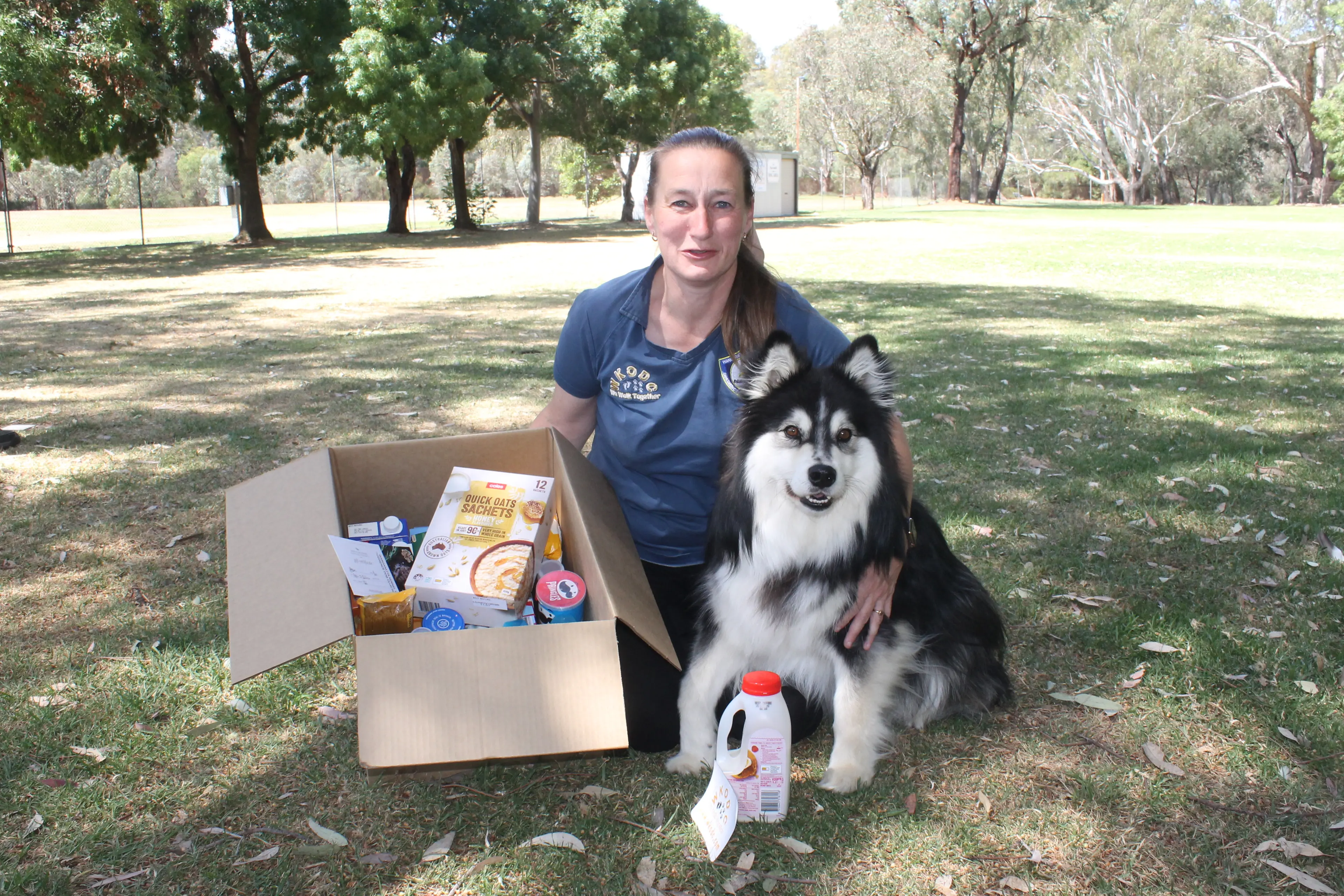 <p>CHRISTMAS SPIRIT: Melissa Murdock and Bandit the Finnish Lapphund, have been busy packing Advent Grocery Boxes with essential groceries, a voucher from Appin Street Butcher, and a special gift.</p>\\n