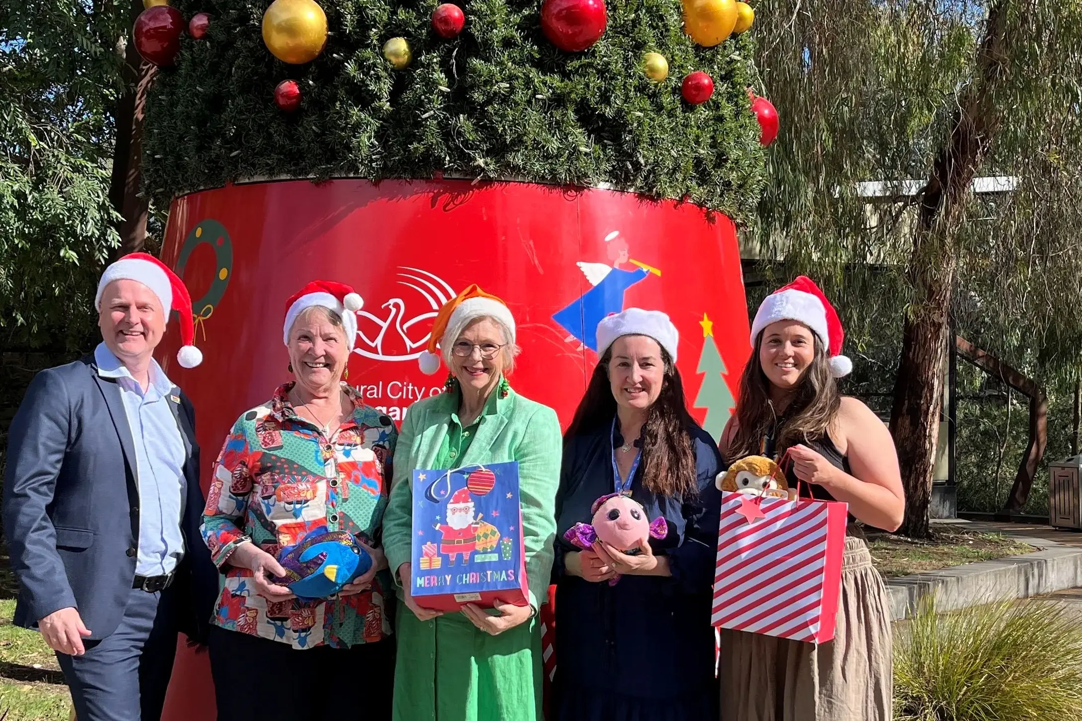 <p>THE GIFT THAT KEEPS ON GIVING: The Give A Gift Appeal has garnered a great deal of support this year and is backed by (from left); Trent Dean and Ruth Davenport (Gateway Health), long-time supporter Helen Haines MP, Kelly Timms (CAV), and Brooke Henwood (UMFC), plus the amazing efforts of the wider community. PHOTO: Grace Fredsberg</p>\\n