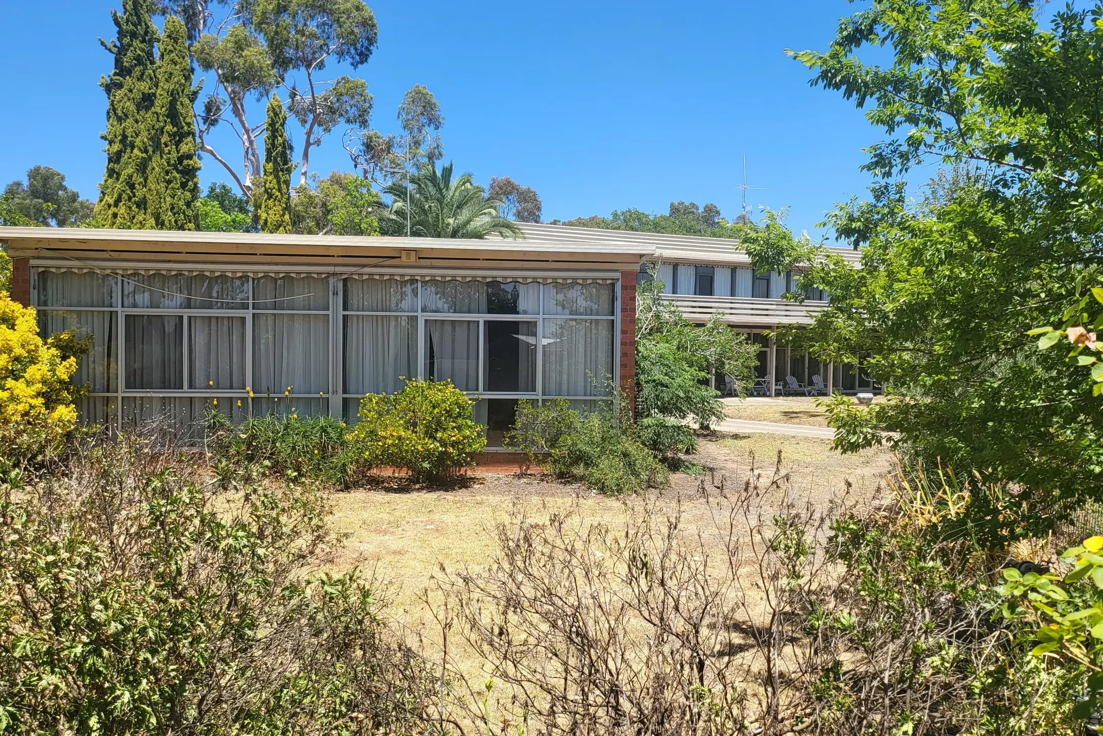 <p>END OF AN ERA: The heritage listed caretaker\\'s quarters in Bruck Court will be demolished to make way for five two-storey townhouses. Another two townhouses will be built on the western side behind Bruck House which will remain. PHOTO: Steve Kelly</p>\\n