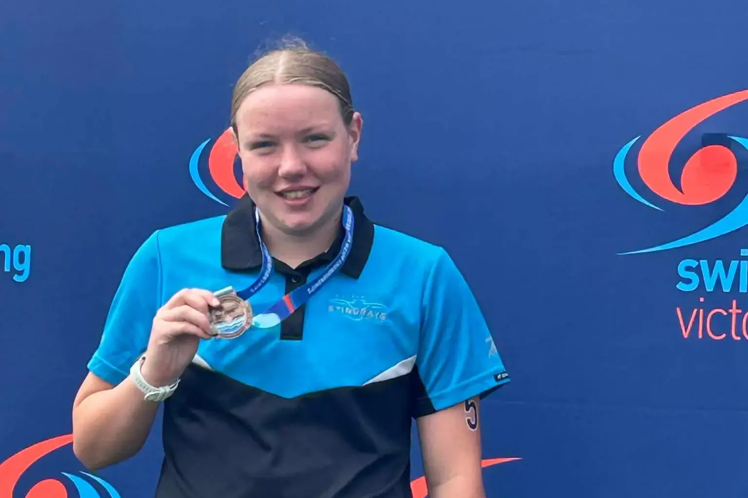 Sanders claims bronze in open ocean swim