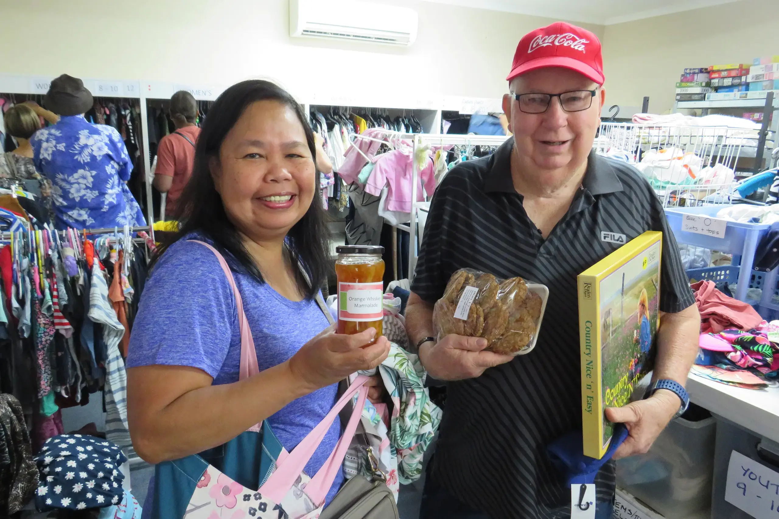 <p>ONE LAST VISIT: Rowena and Peter Swain with their collection of purchases from the Lutheran Op Shop on Thursday. PHOTO: Simone Kerwin</p>\\n