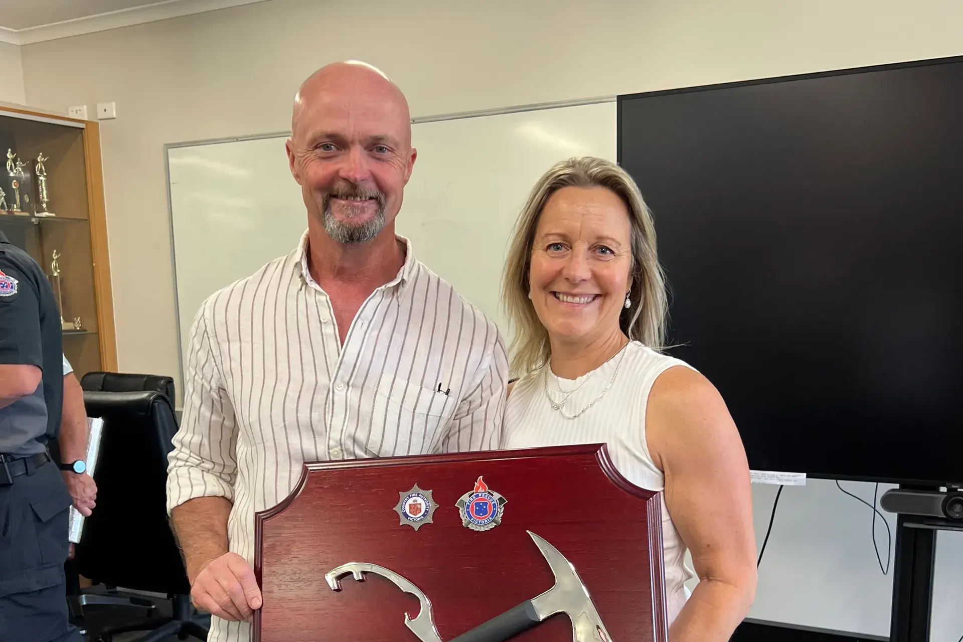 <p>HANGING UP THE HOSE: David Brock and wife Cynthia Brown with David\\'s plaque for 30 years with CFA and FRV as he retired in November. </p>\\n
