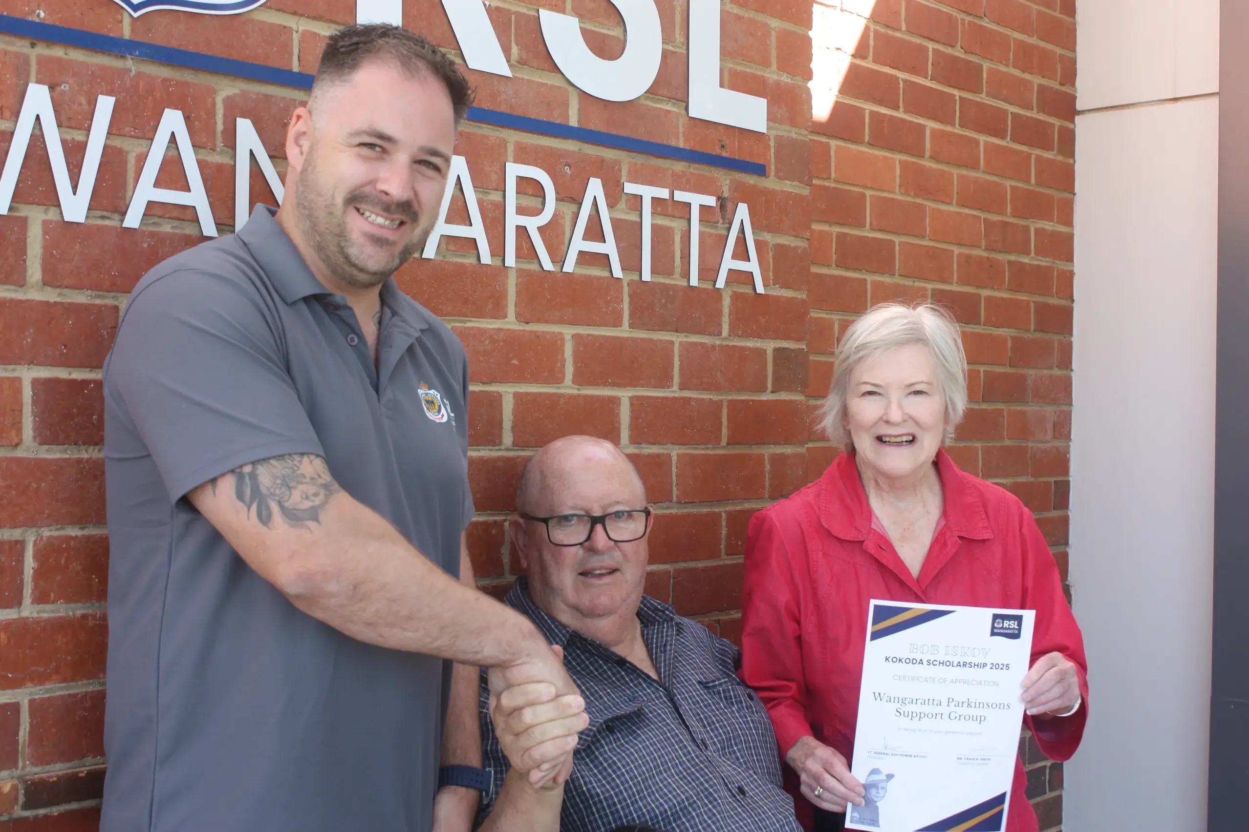 <p>KIND GESTURE: Wangaratta RSL general manager Chris Simsen (left) gratefully accepted a $1500 donation from local Parkinson\\'s Disease Support Group members David James and Ros Taylor towards the Bob Iskov Kokoda Trail scholarship. PHOTO: Bailey Zimmermann</p>\\n