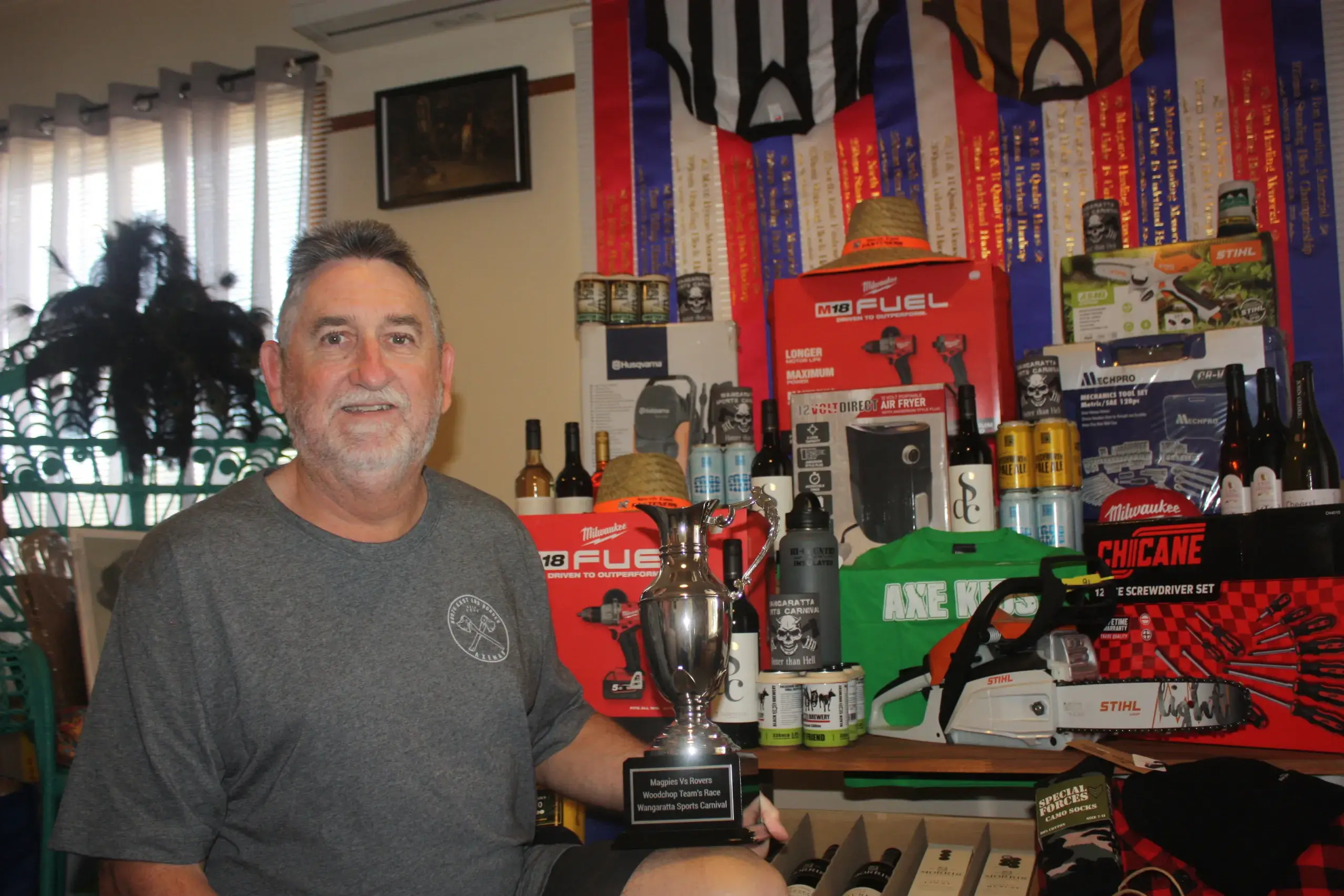 <p>IN FOR A CUT: Peter King from the North East Border Axeman\\'s Association with the host of ribbons and prizes up for grabs at this Saturday\\'s Wangaratta Sports Carnival woodchopping competition. PHOTO: Grace Fredsberg</p>\\n