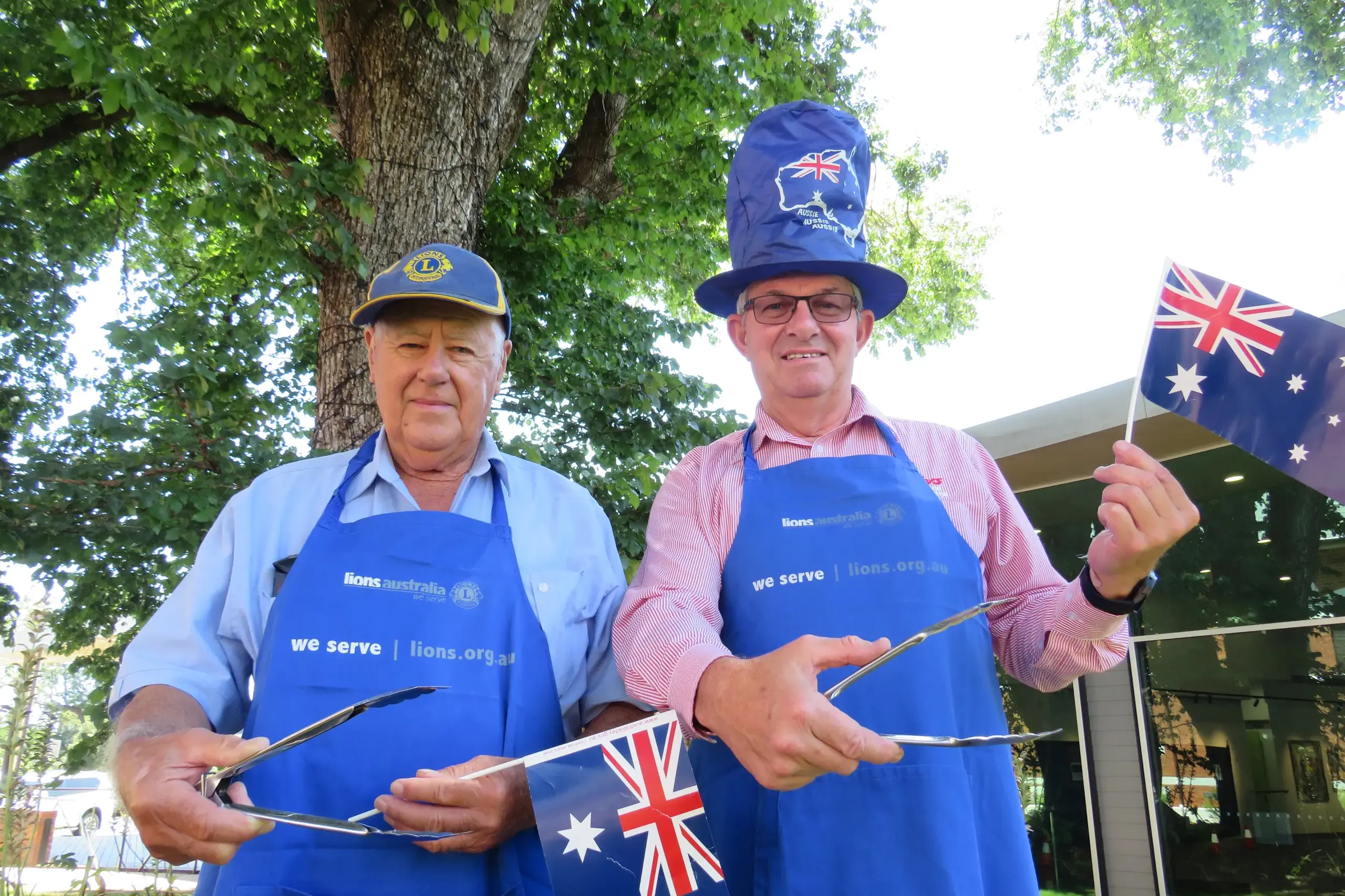 <p>CELEBRATE AUSTRALIA WITH A BARBIE: Wangaratta Lions Club\\'s Tom Little and John Houghton are all set for Monday\\'s Australia Day celebrations in the rural city, which will include a free barbecue hosted by the Lions Club. The city\\'s 9am ceremony to mark the day has been moved to the Wangaratta Performing Arts and Convention Centre due to expected warm temperatures. The barbecue will be available near the Wangaratta Cenotaph following the ceremony. PHOTO: Simone Kerwin</p>\\n