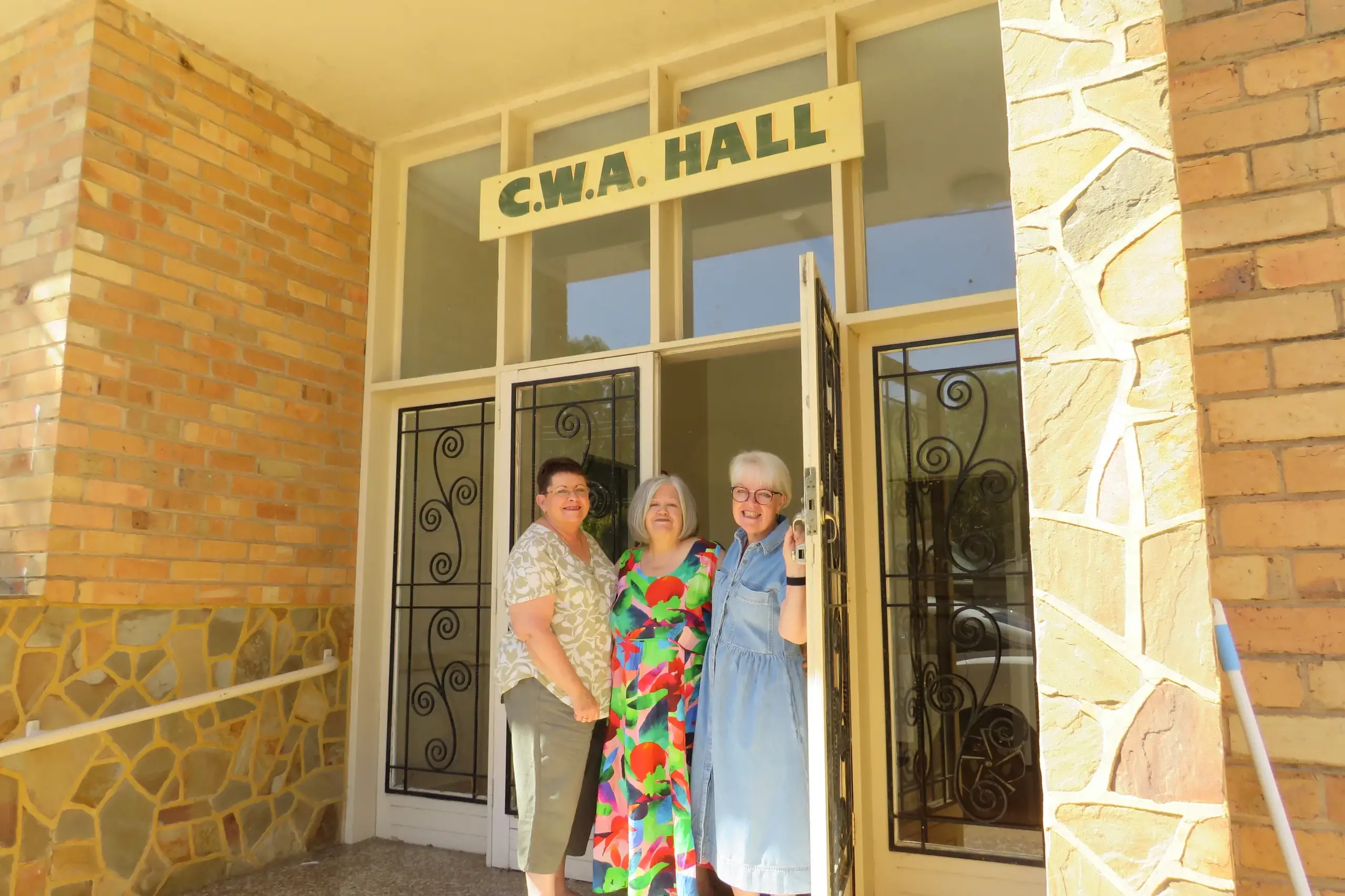 <p>NEW ERA: Wangaratta CWA branch co-secretary Carol Blight, treasurer Jackie Selwood and president Heather Betts at the door of the CWA Hall in Templeton Street, which has been sold to commercial investors.  The CWA plans to continue operating in the rural city, and is looking forward to being able to focus more on supporting the community without the need to fundraising to maintain the 70-year-old building.  PHOTO: Simone Kerwin</p>\\n