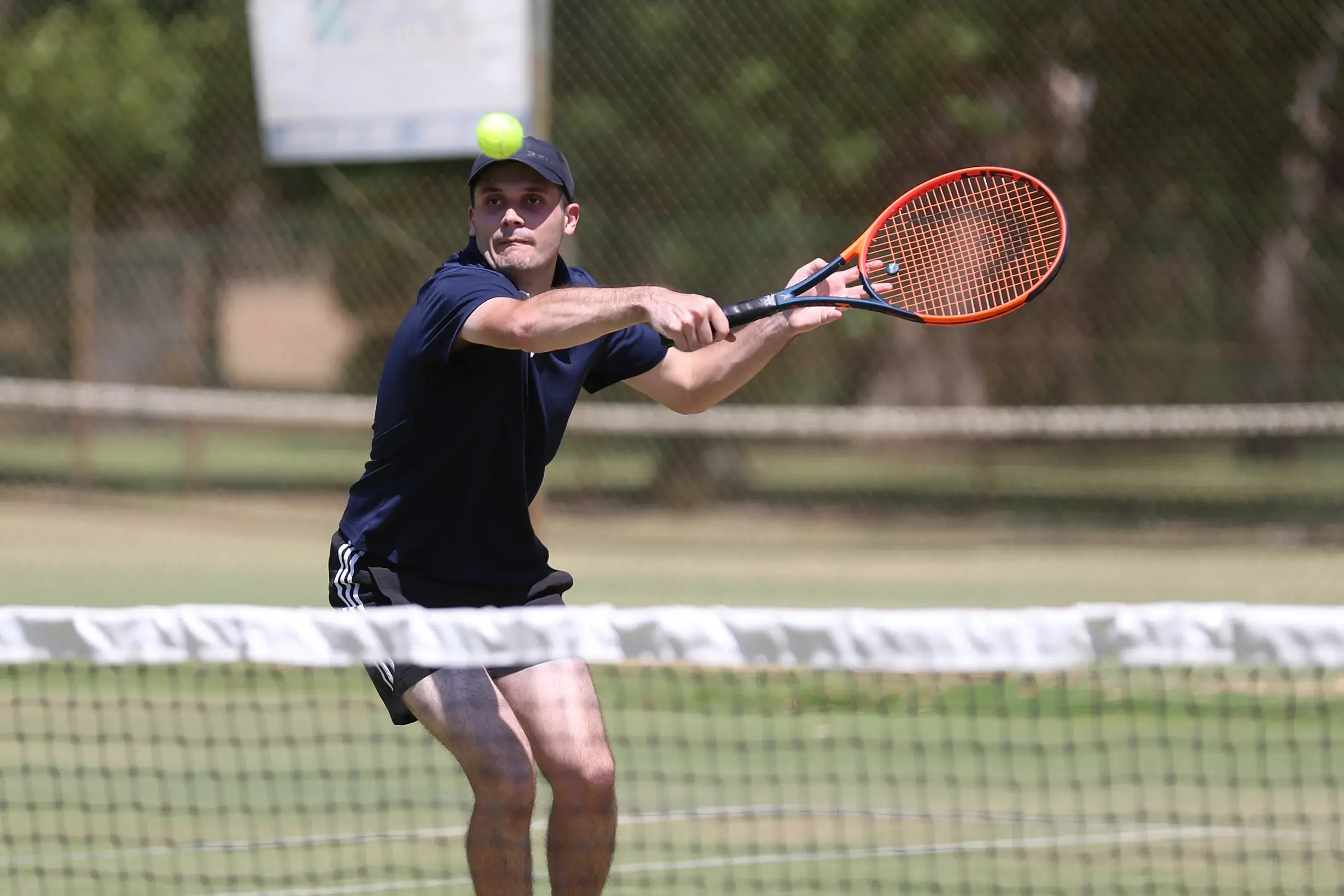 <p>AT THE NET: Thomas McDonald advances and goes for a backhand volley. PHOTOS: Melissa Beattie</p>\\n