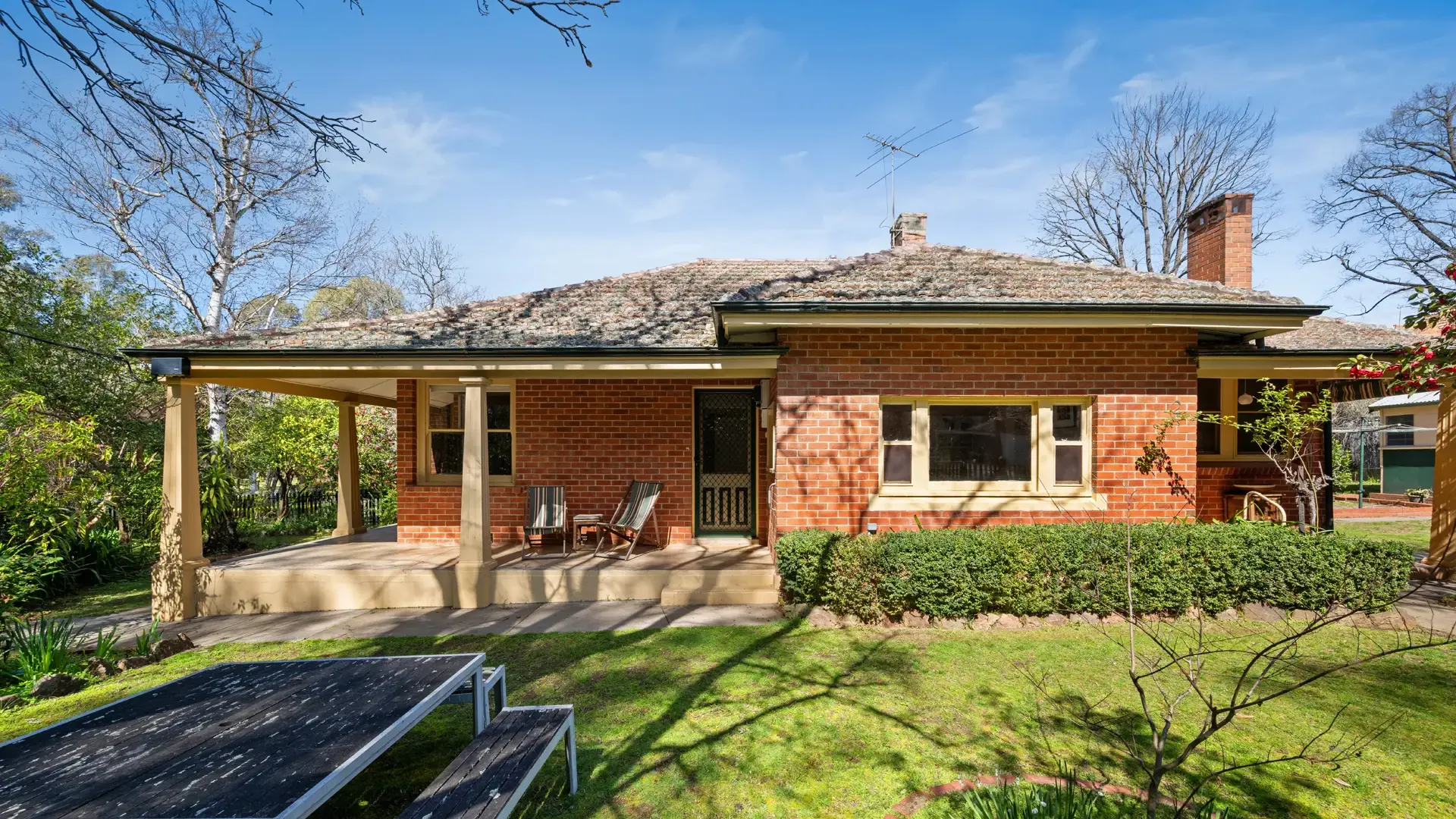 Charming red brick in sought-after setting