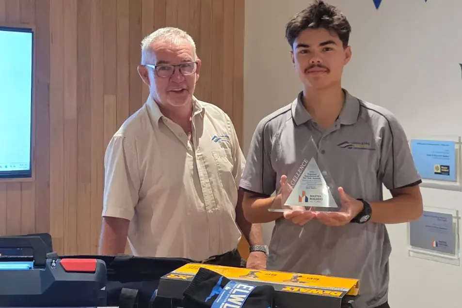 <p>TOP HONOUR: Fourth year carpentry apprentice Jack Kelly and Ovens and King Builders director Lachie Gales are pictured with the $3000 worth of prizes Jack won for being the Master Builders of Victoria Apprentice of the Year for the North East. </p>\\n