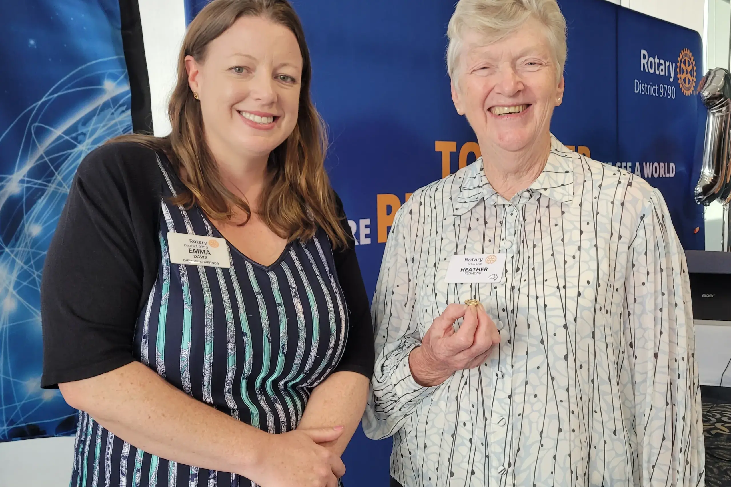 <p>PROUD: District 9790 Governor Emma Davis (left) with Rotary e-Club of Change Makers member Heather Redmond following the presentation of a prestigious Paul Harris Fellowship at a recent club anniversary event. </p>\\n