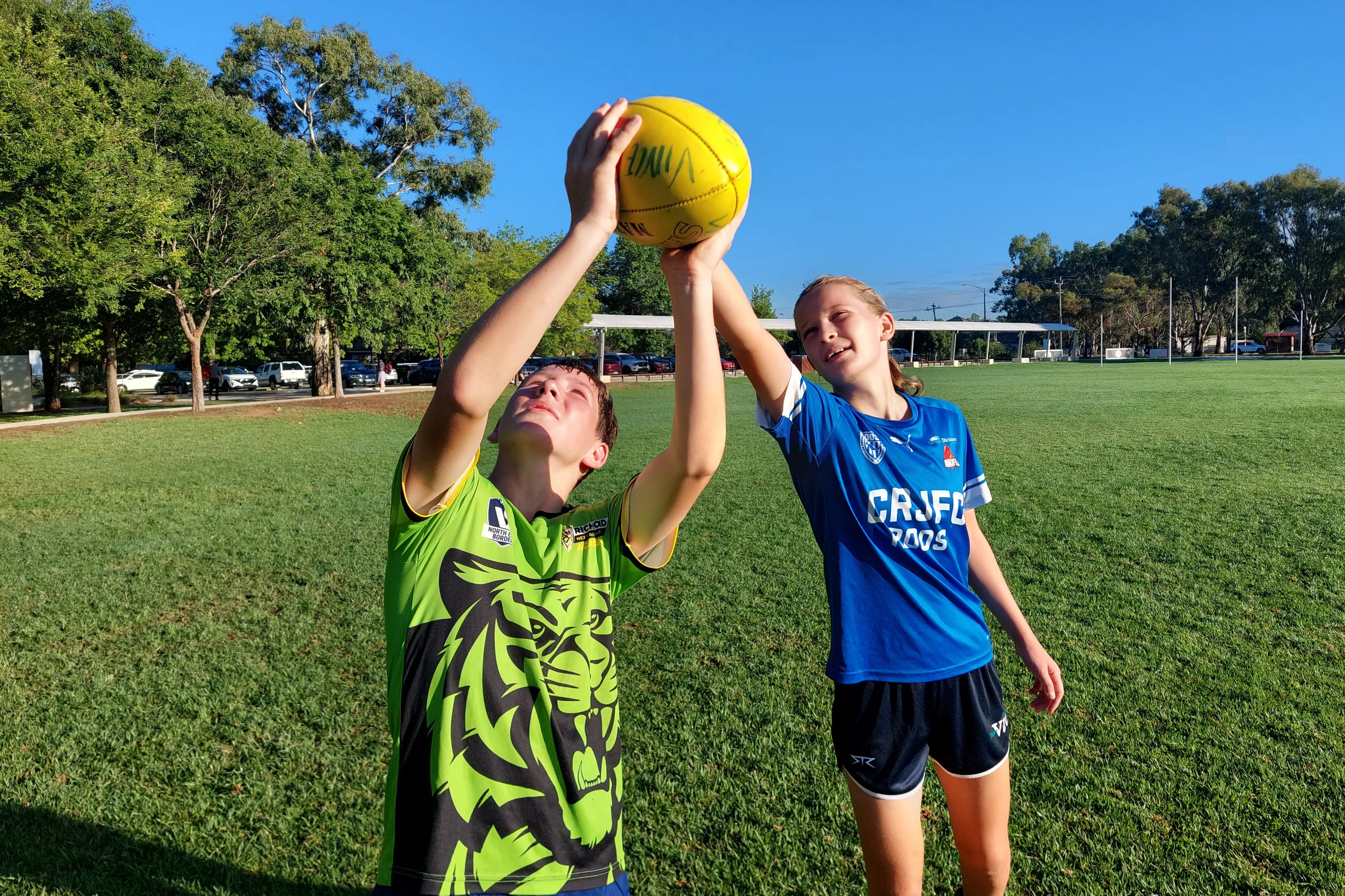 <p>HONING SKILLS: Galen Catholic College students George McCurdy and Amelia Hart are among the youngsters involved in the school\\'s weekly before-school football training program. </p>\\n