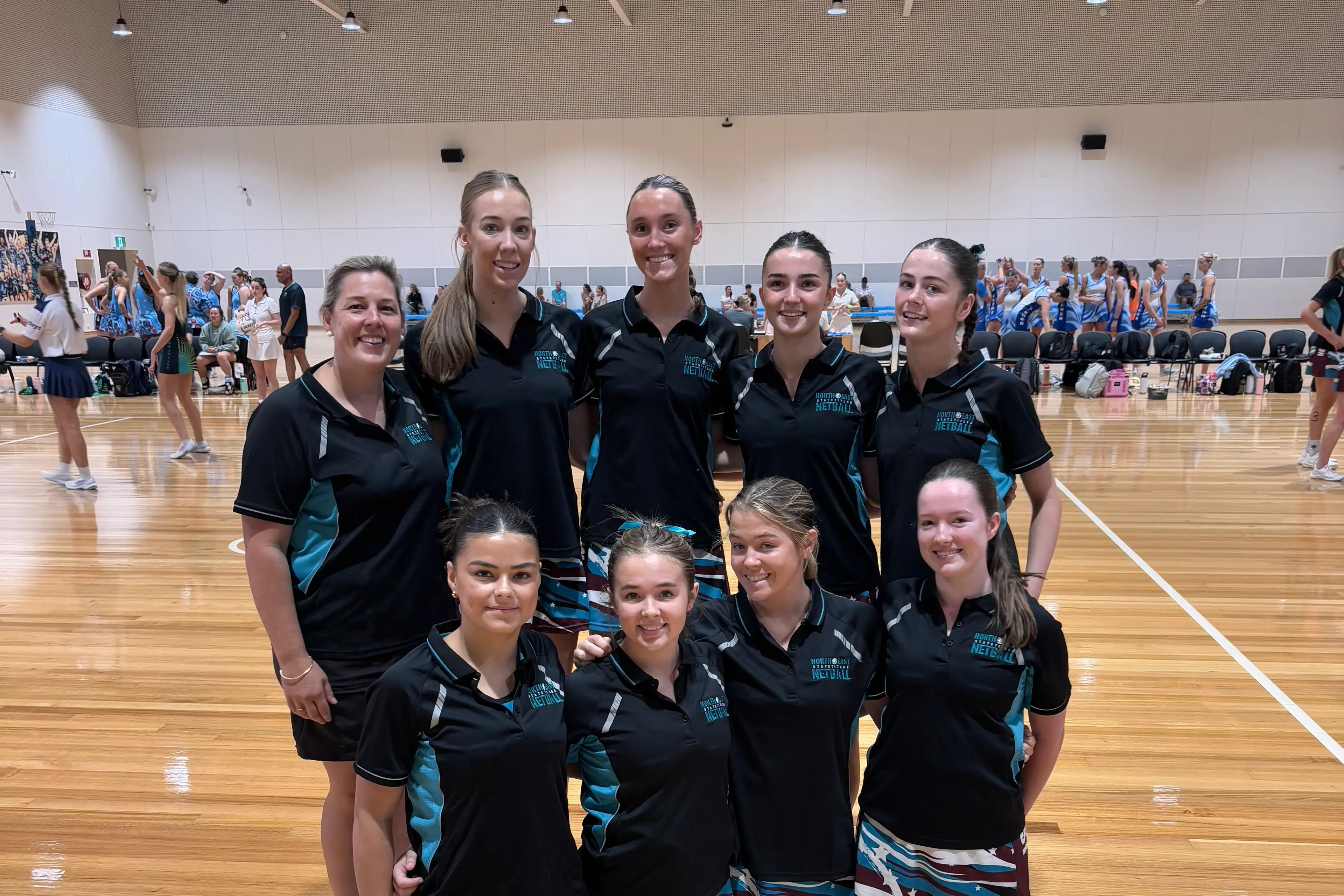 <p>ON THE BIG STAGE: Local netballers (back, from left) coach Stacey Lamb, Lily Palmer, Lily Lyster, Arabella Cavicchiolo, Lainey Draper, (front from left) Grace Saunders, Minnie Humphry, Holly Humphry and Isabelle McMahon at the Netball Victoria state titles on the weekend.</p>\\n