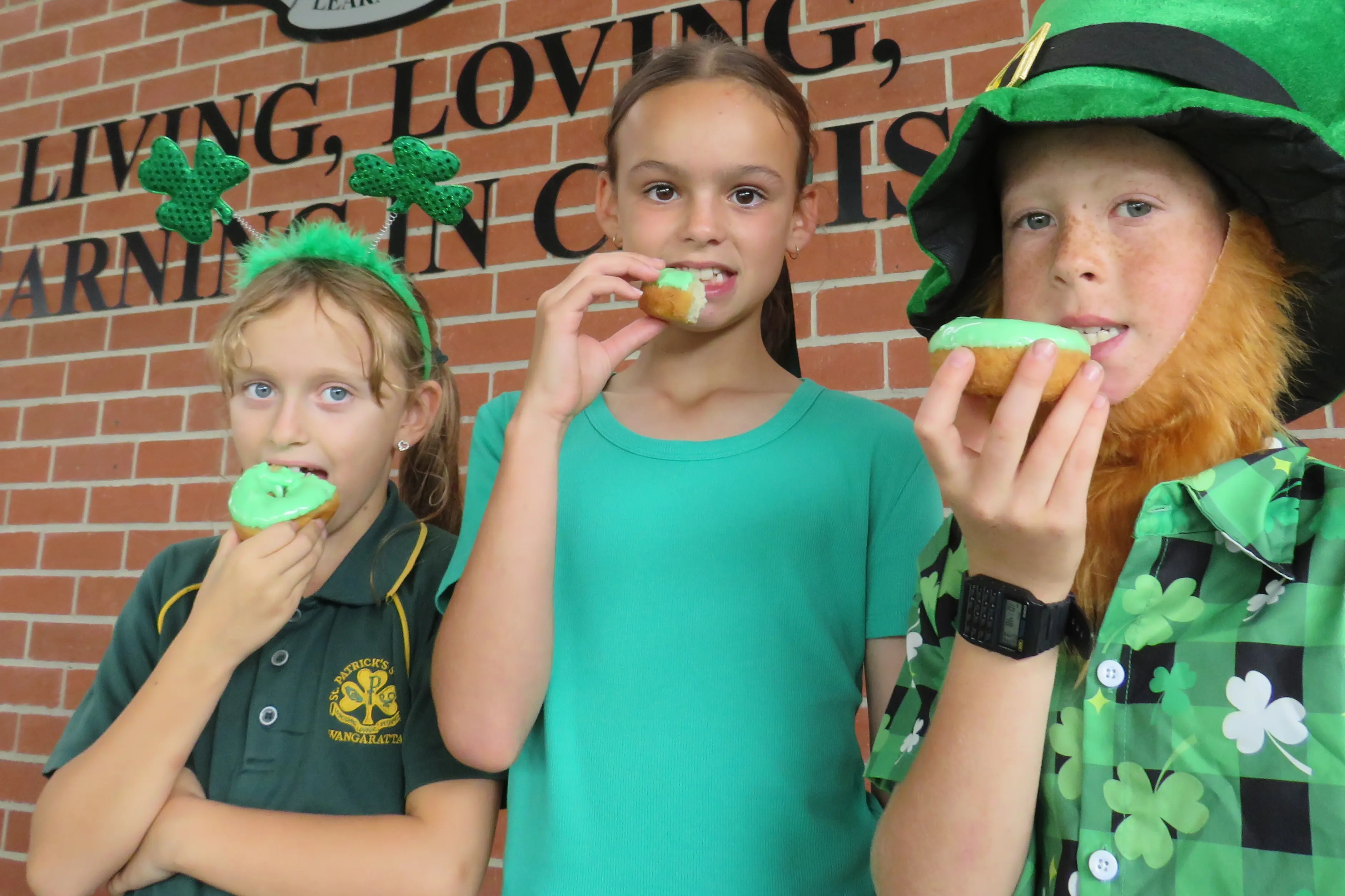 <p>DAY OF CELEBRATION: Frankie Routledge, Regan Wilson and Harvey Forster tucked into green-iced donuts as St Patrick\\'s Primary School students marked St Patrick\\'s Day yesterday. PHOTO: Simone Kerwin</p>\\n