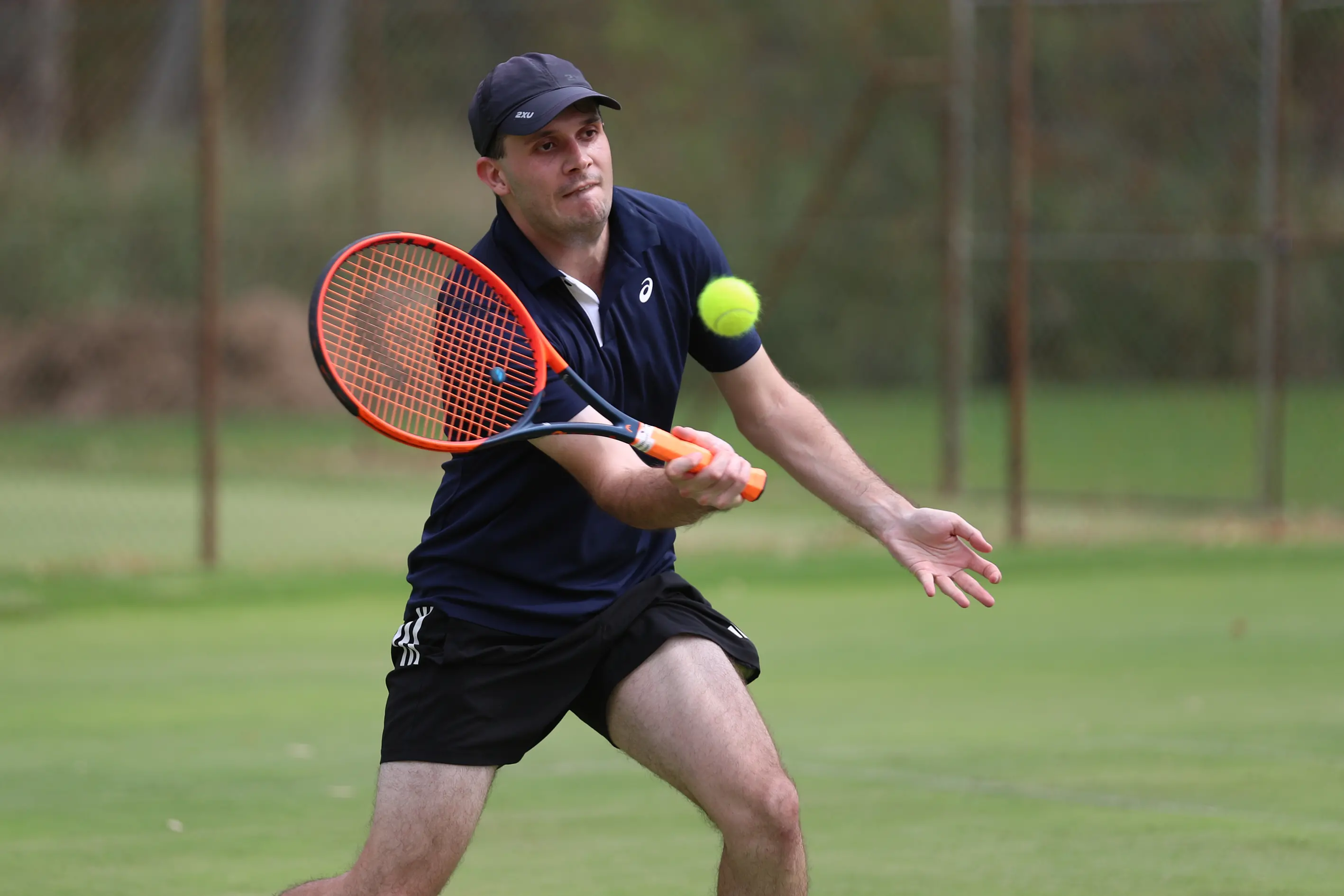 <p>VOLLEY: Thomas McDonald hits a clever forehand volley at the Merriwa Park courts. PHOTO: Melissa Beattie</p>\\n