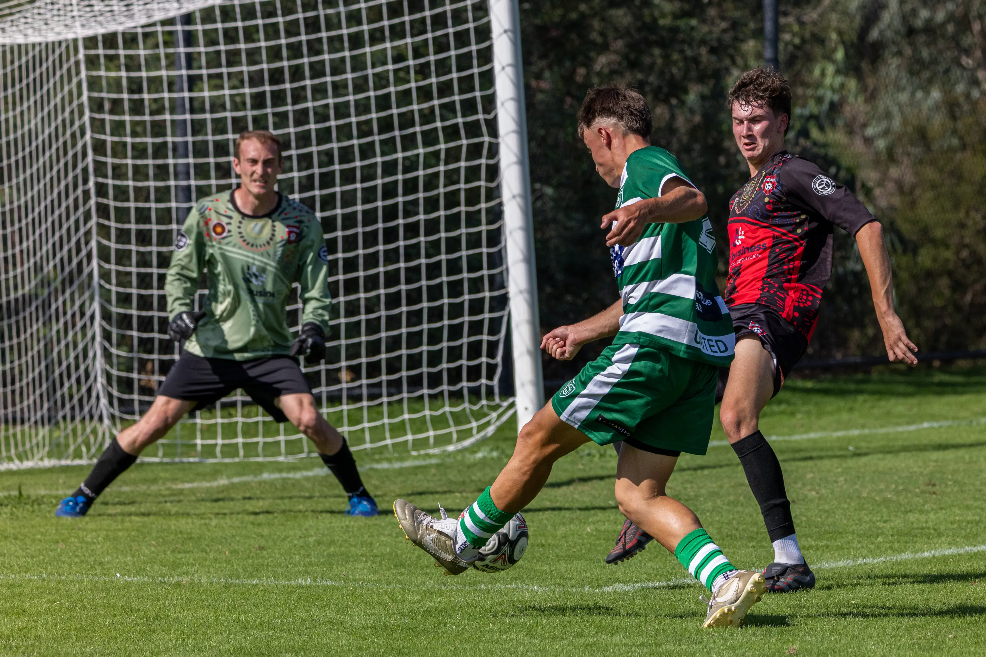 <p>DENIED: Brodie Tyres works across to defend in the Devils\\' draw with Albury United, while Nathan Gleeson waits with the gloves to make the save if needed. </p>\\n