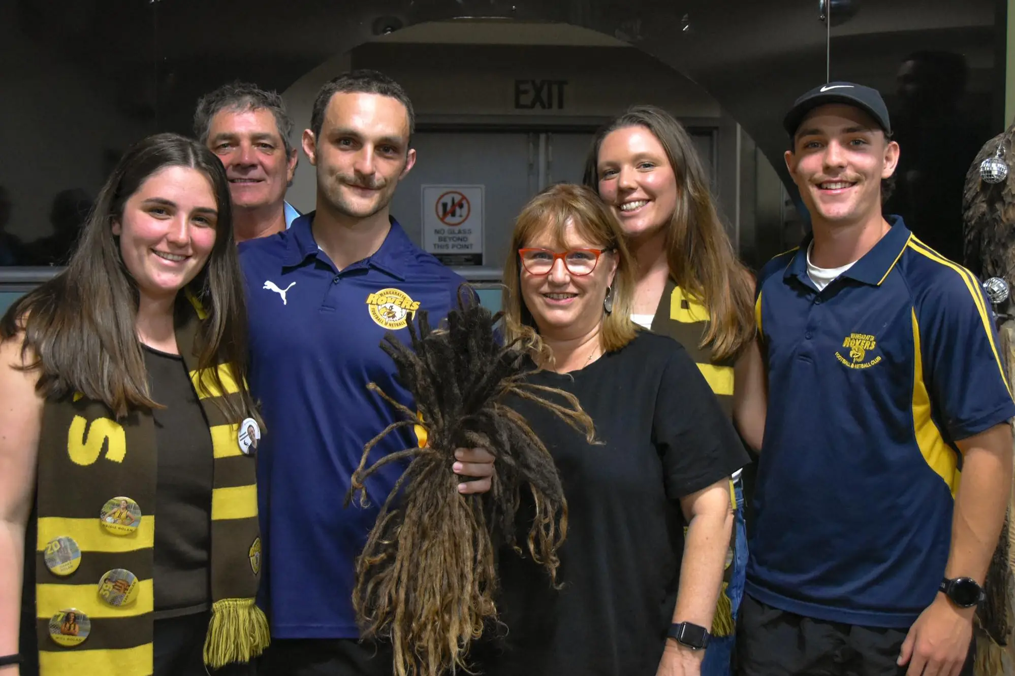 <p>OVER $20,000 LOCKED IN: Wangaratta Rovers senior footballer Will Nolan, pictured with his family, helped raise more than $20,000 by shaving off the locks which grown on his head for the past 13 years. PHOTO: WRFNC Facebook</p>\\n