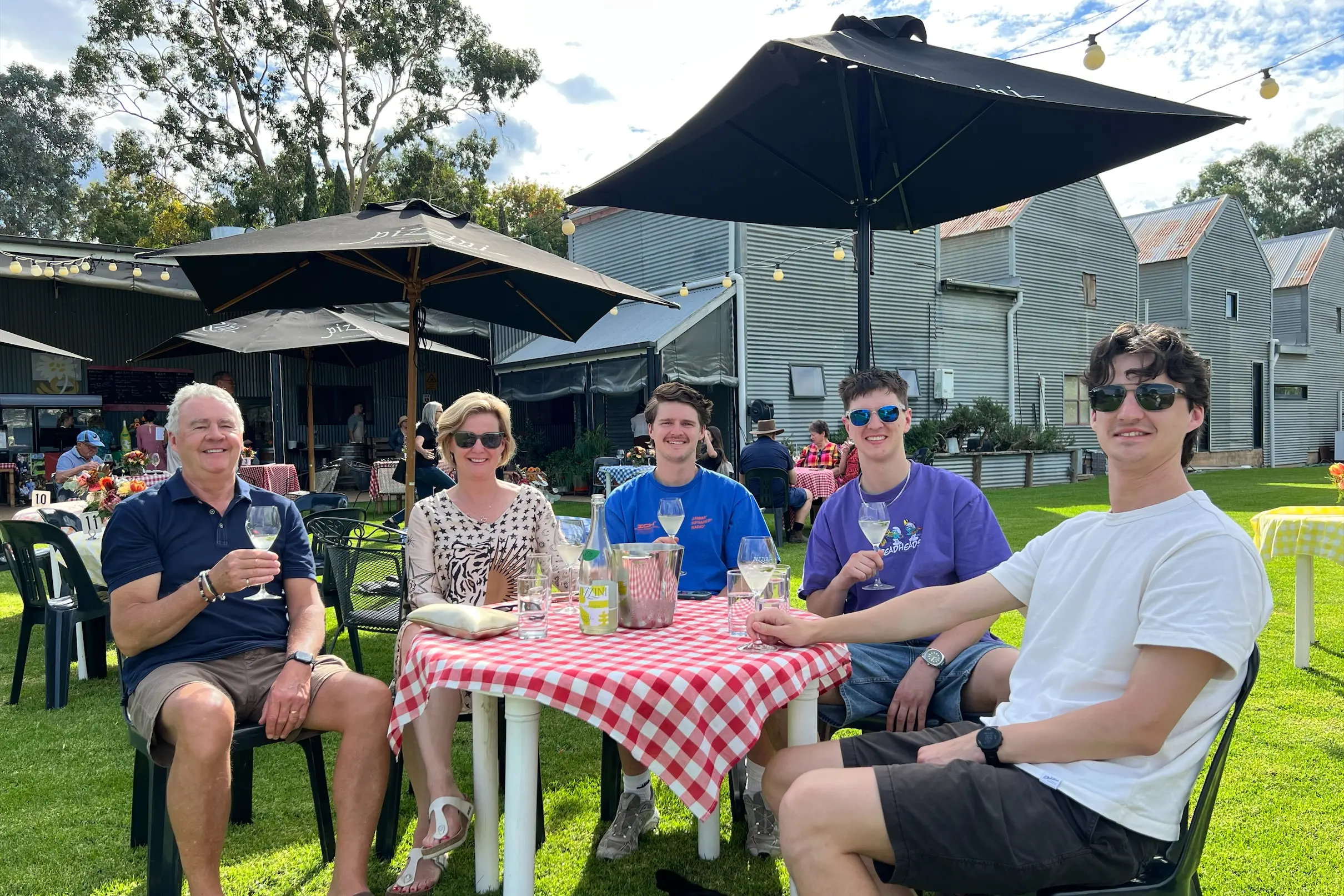 <p>CHEERS TO THAT: Wayne, Sally, Harry, Max and Mitchell Burgoyone enjoy a glass at Pizzini Wines over the Easter weekend. PHOTO: Pizzini Wines</p>\\n