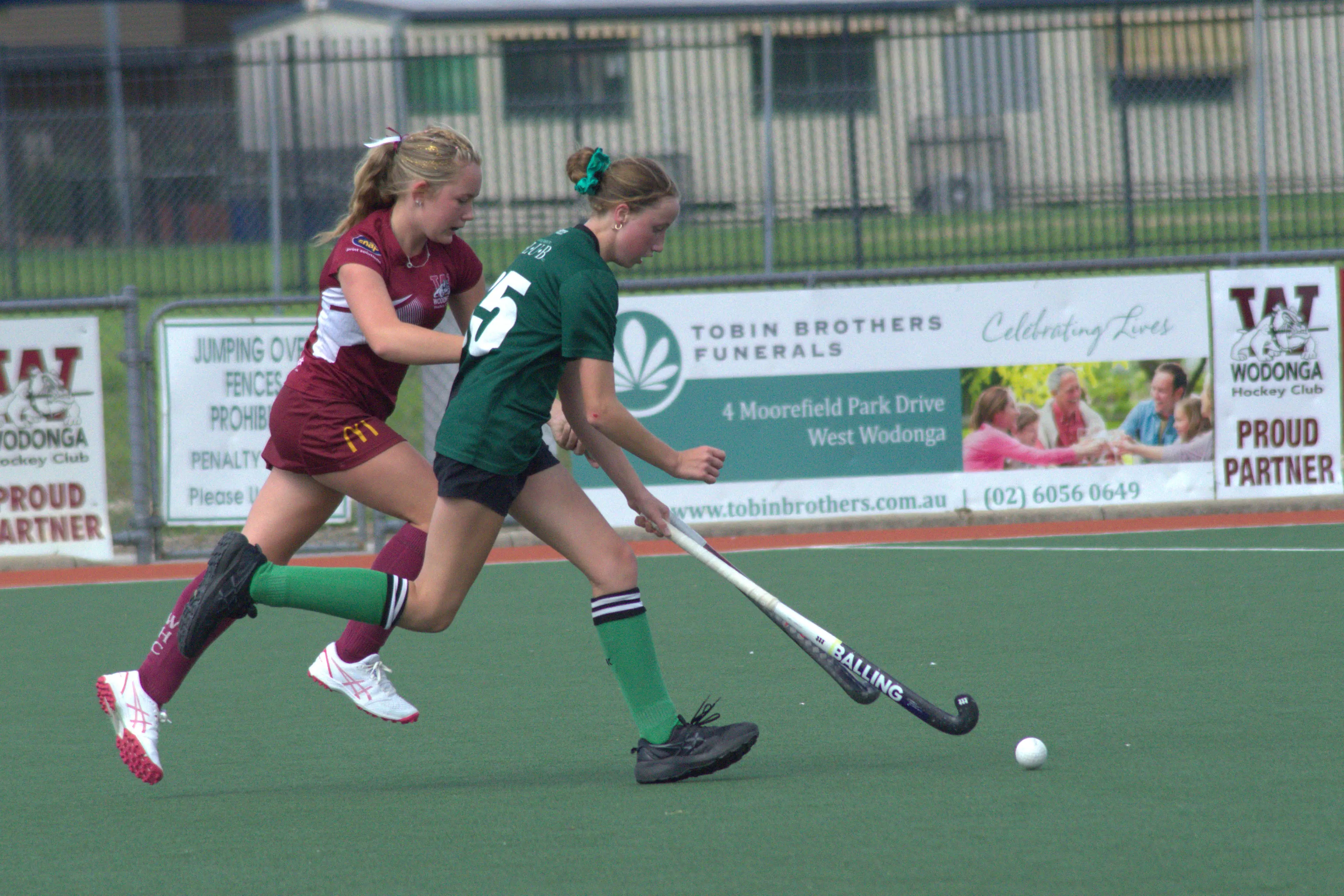<p>GO TOGETHER: Wangaratta\\'s Elsie Cunneen keeps the ball away from her opposition in the opening round of the Hockey Albury Wodonga season. PHOTO: Wes Samson</p>\\n