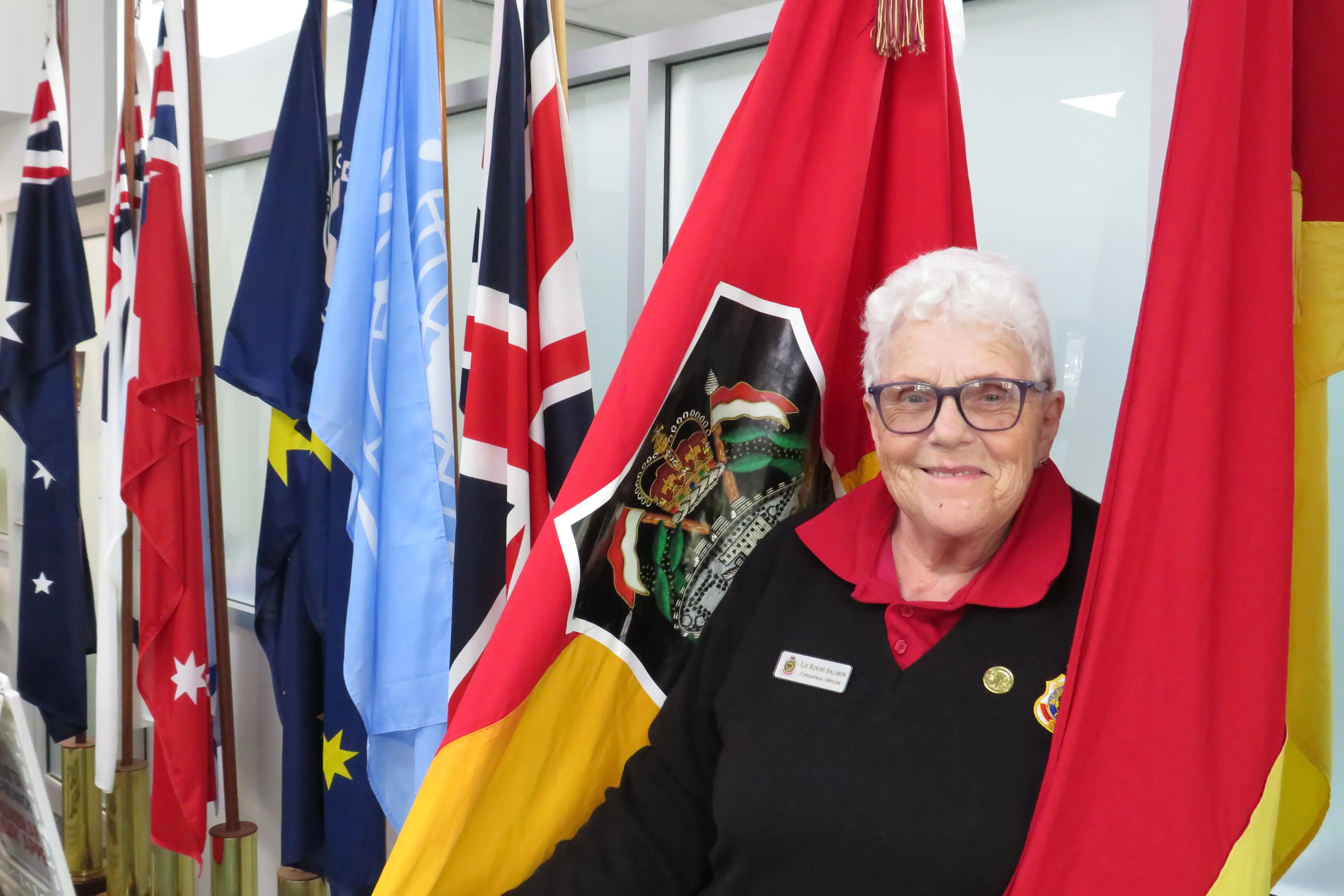 <p>READY TO GO: Wangaratta RSL Sub-Branch ceremonial officer Liz Rouse Salmon with flags on display in the RSL Annexe in Templeton Street, where they will be easily accessible for Saturday\\'s ANZAC Day march.  The new museum at the annexe, highlighting the district\\'s military history, will be open for the first time on ANZAC Day between 12 noon and 5pm.  PHOTO: Simone Kerwin             </p>\\n
