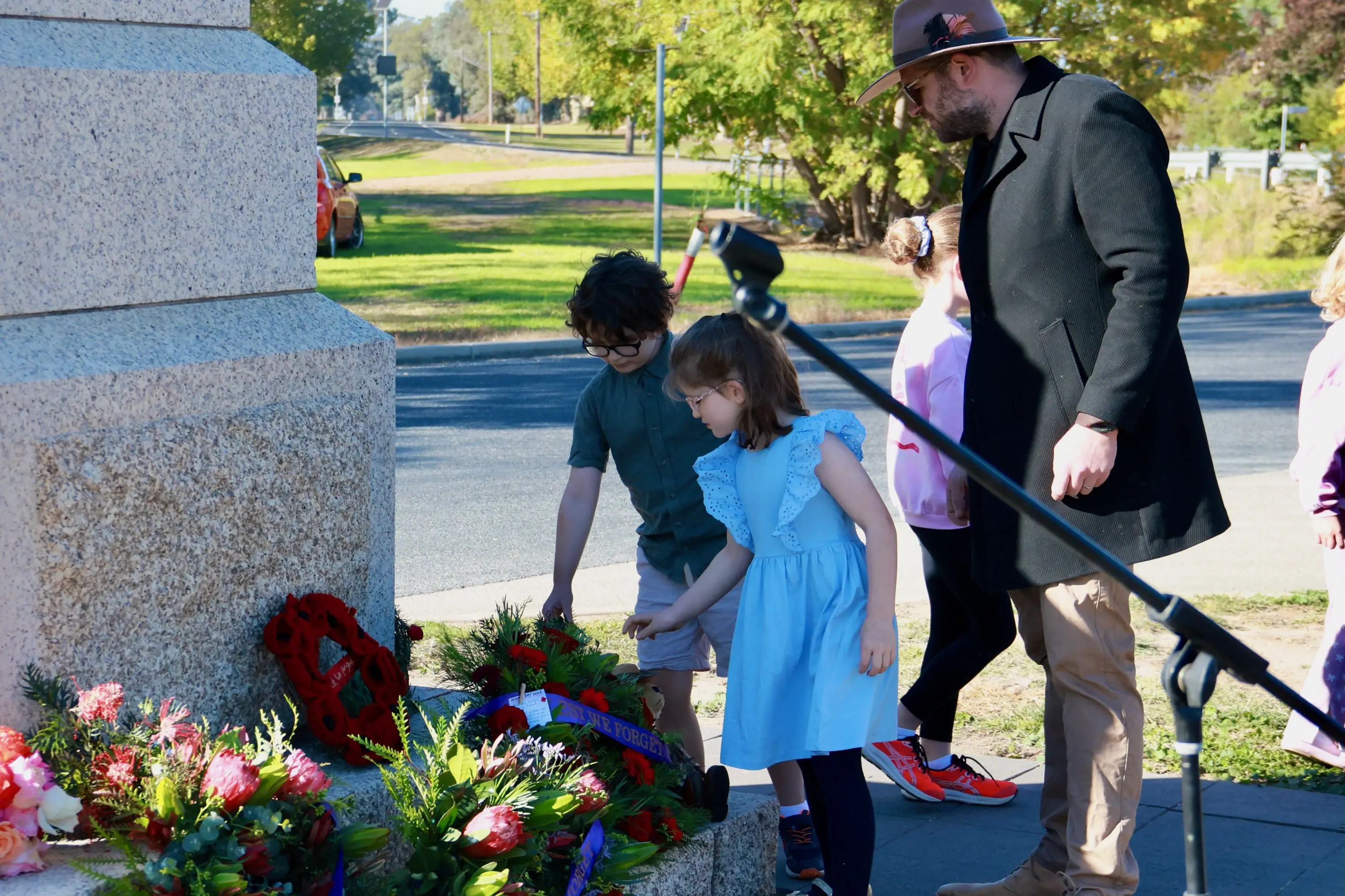<p>SHARING THE DAY: People of all ages paused to remember and reflect at Everton. </p>\\n