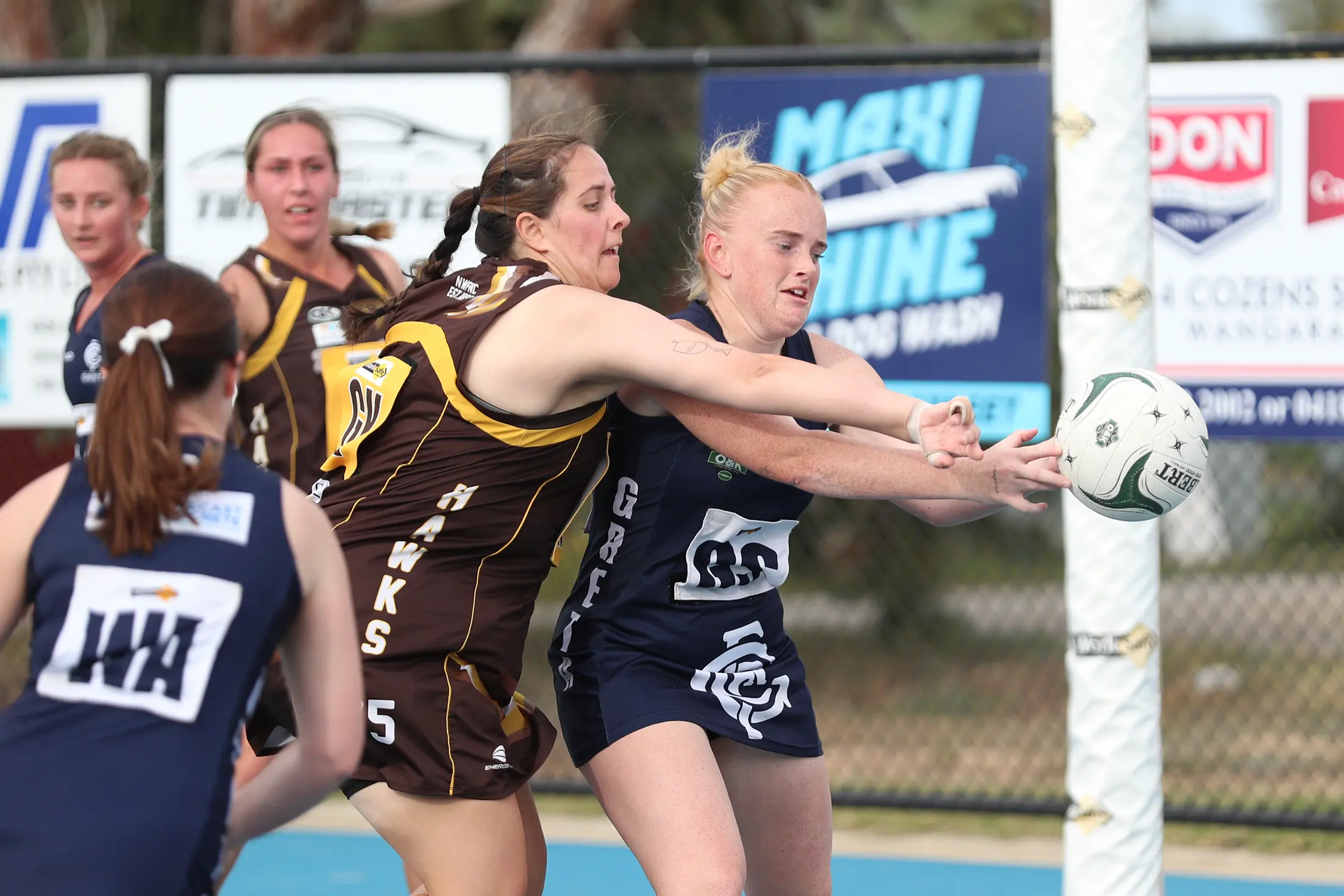 <p>DENIED: North Wangaratta defender Bree Cheong knocks the ball away from Greta shooter Taylah Reidy. PHOTO: Melissa Beattie</p>\\n