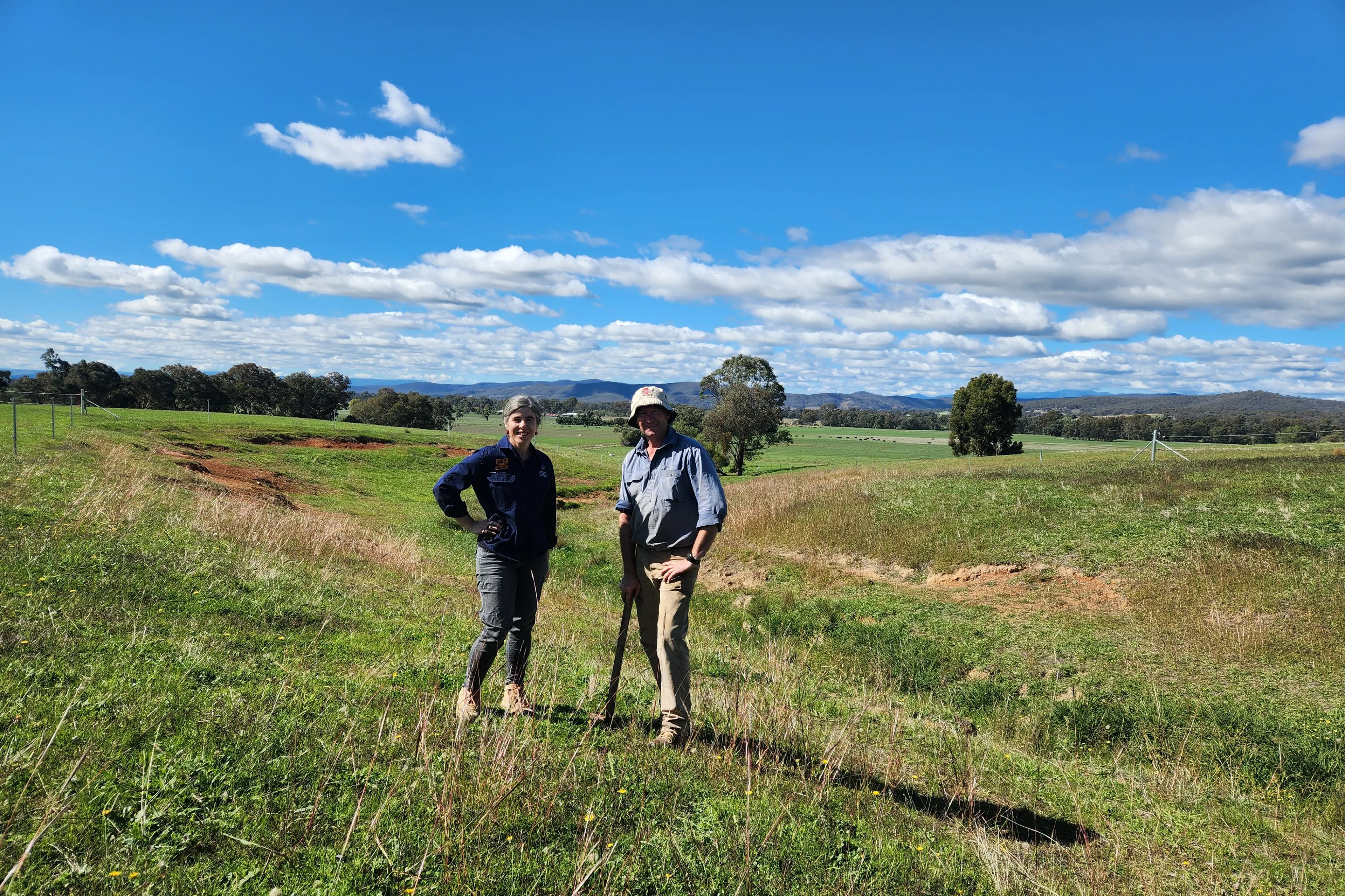 <p>ECOLOGY BOOST: North East CMA senior project officer Sally Day with Moyhu beef producer Joe McKenzie checking out the success of the farm\\'s re-vegetation project. PHOTO: NECMA</p>\\n