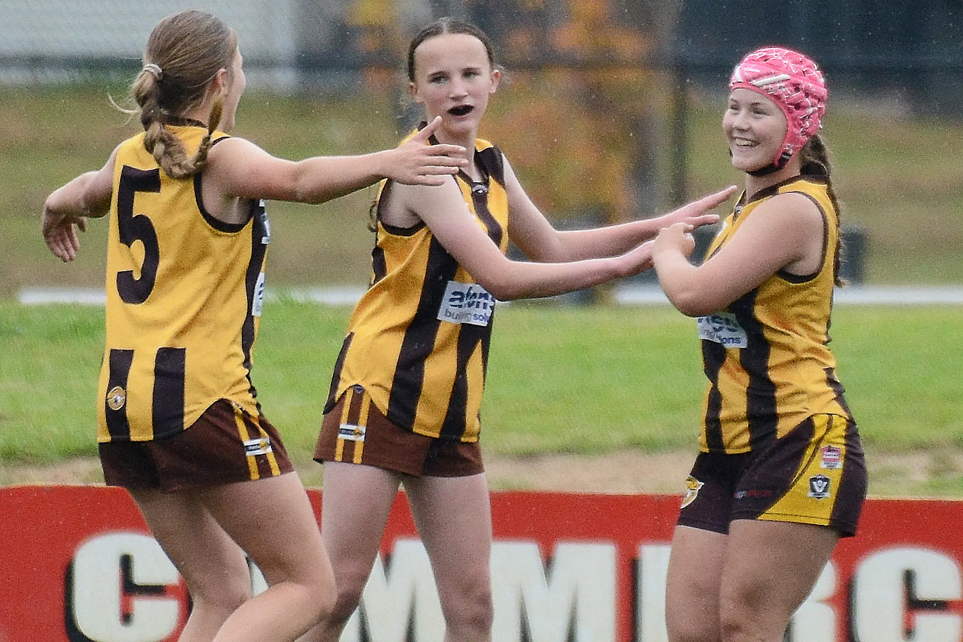 <p>GET AROUND HER: Teammates converge on Izzy Foster after she kicked one of her six goals in the under 15\\'s massive win. PHOTOS: Kev McGennan</p>\\n