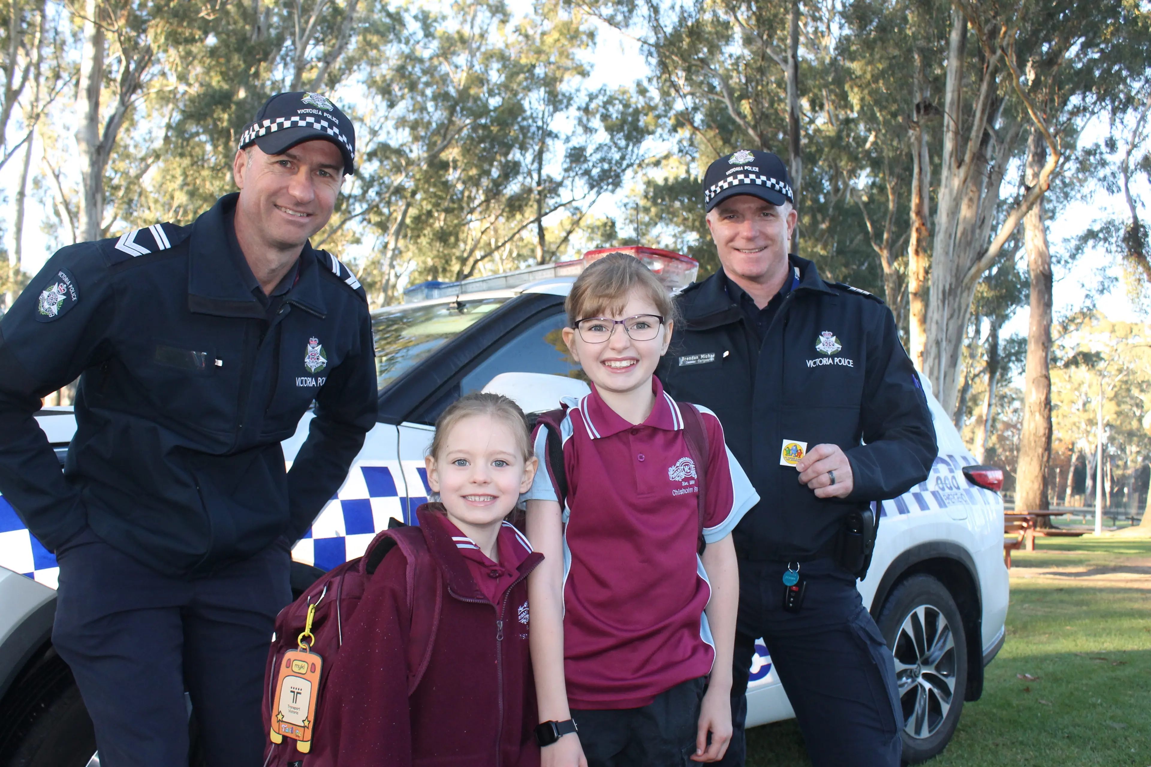 <p>TEAM EFFORT: Leading Senior Constable Mark Staley (left), Ava and Lidia Kendrick and Senior Sergeant Brendan Michael get ready to walk to school last Friday. PHOTO: Bailey Zimmermann</p>\\n