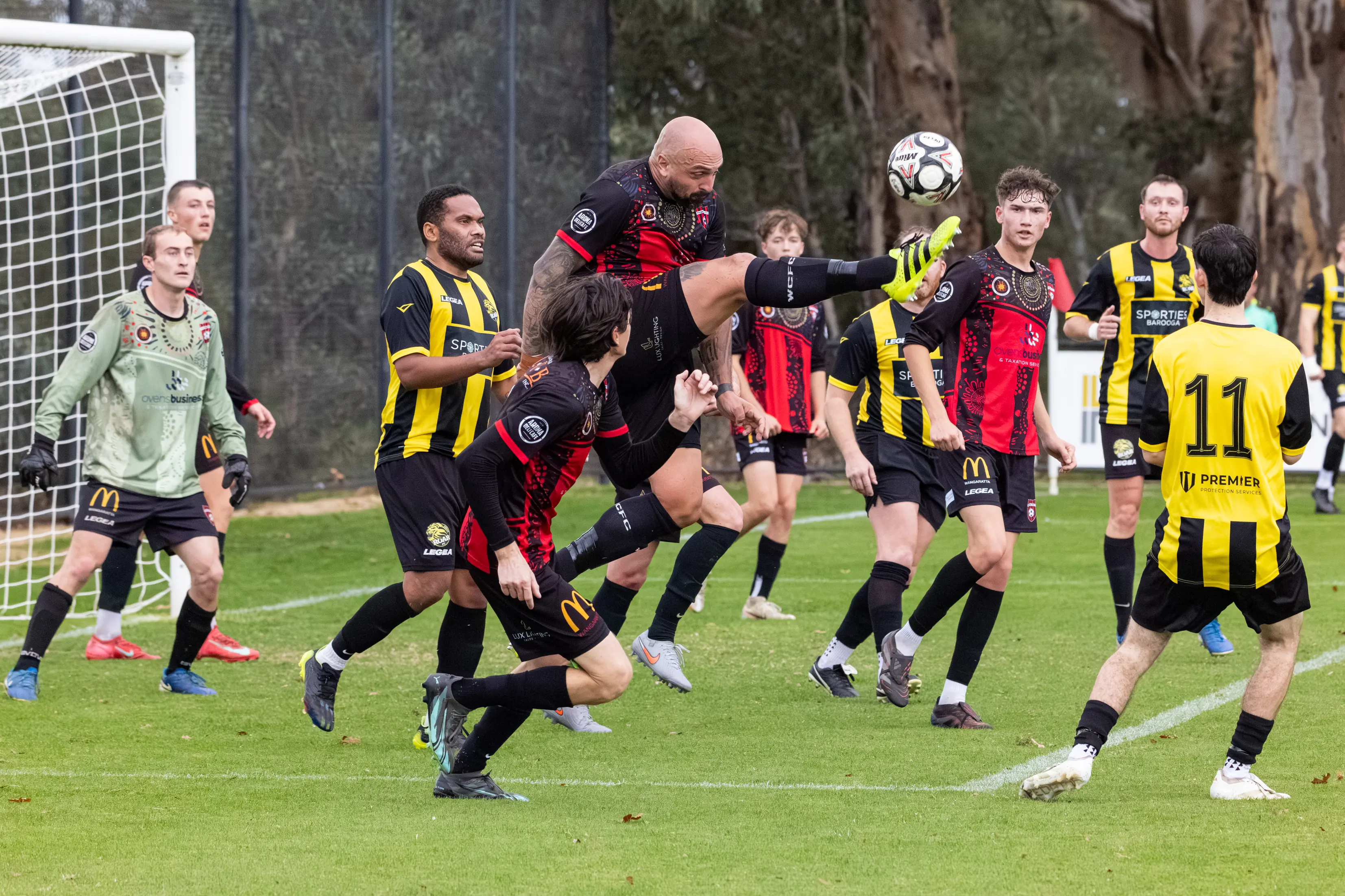 <p>CLEAR IT: Stoycho Ivanov desperately tries to clear the ball from the Devils\\' goal face in their dramatic 4-3 added time win over Cobram. PHOTOS: Marc Bongers</p>\\n